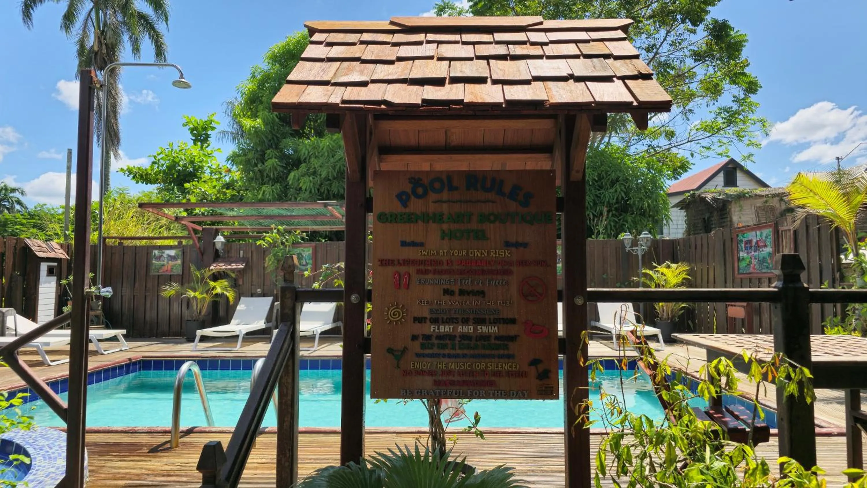 Property logo or sign in Greenheart Boutique Hotel