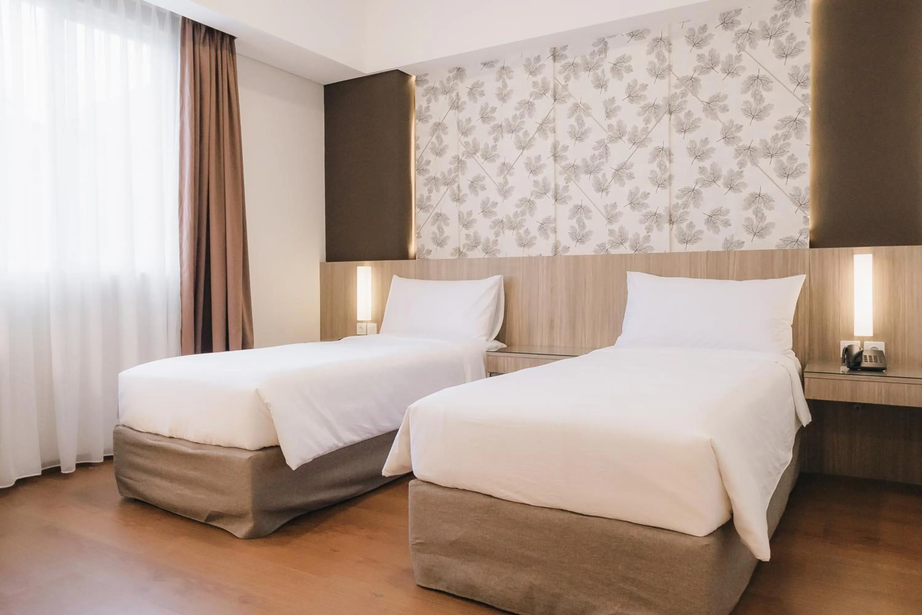 Bed in Grand G7 Hotel Pasar baru