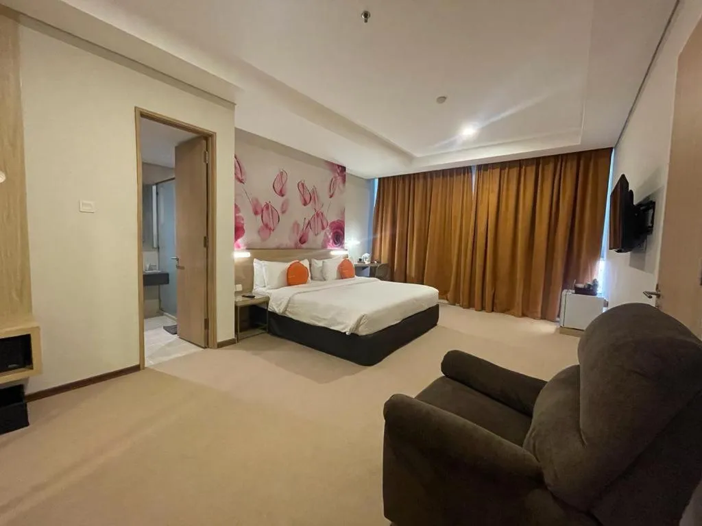 Bed in Grand G7 Hotel Pasar baru