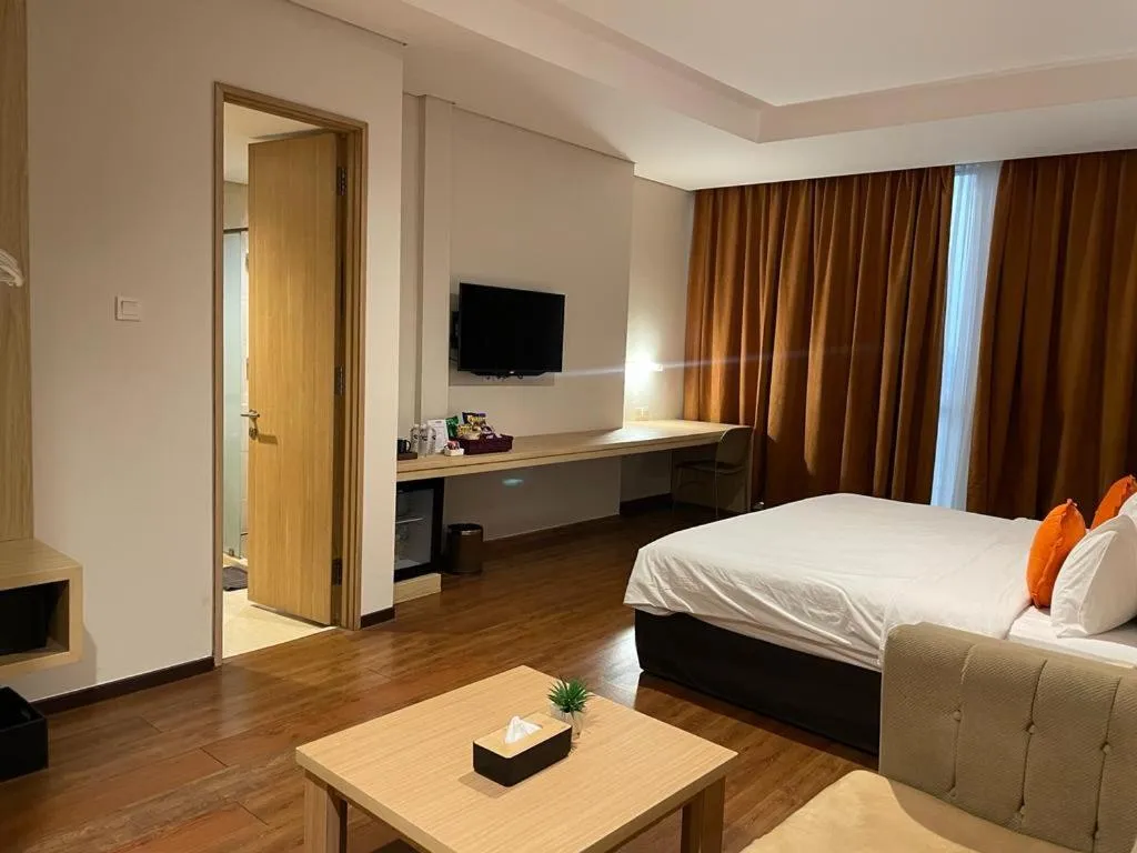 Bed in Grand G7 Hotel Pasar baru