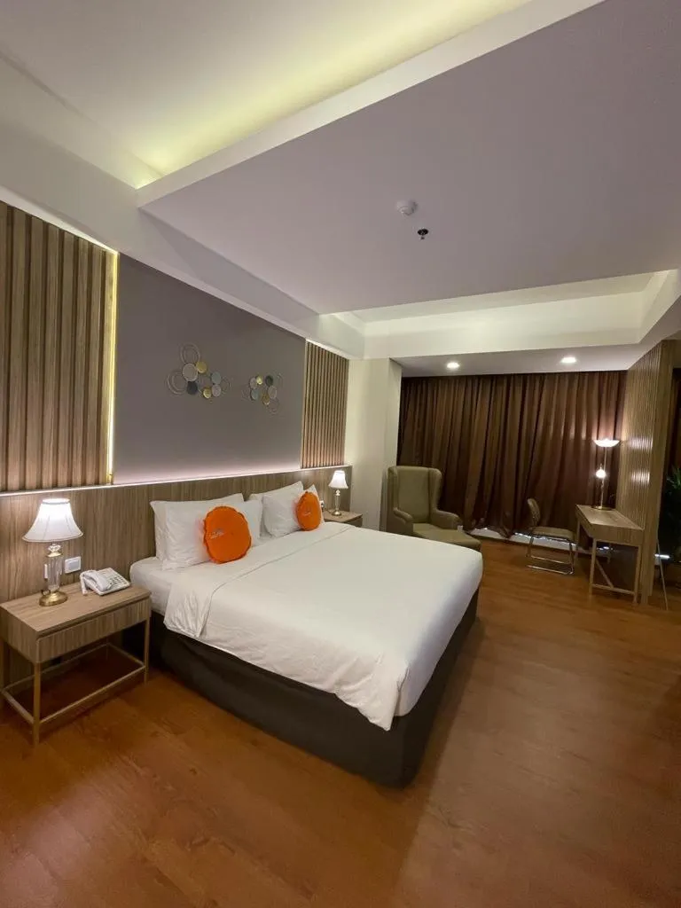 Bed in Grand G7 Hotel Pasar baru