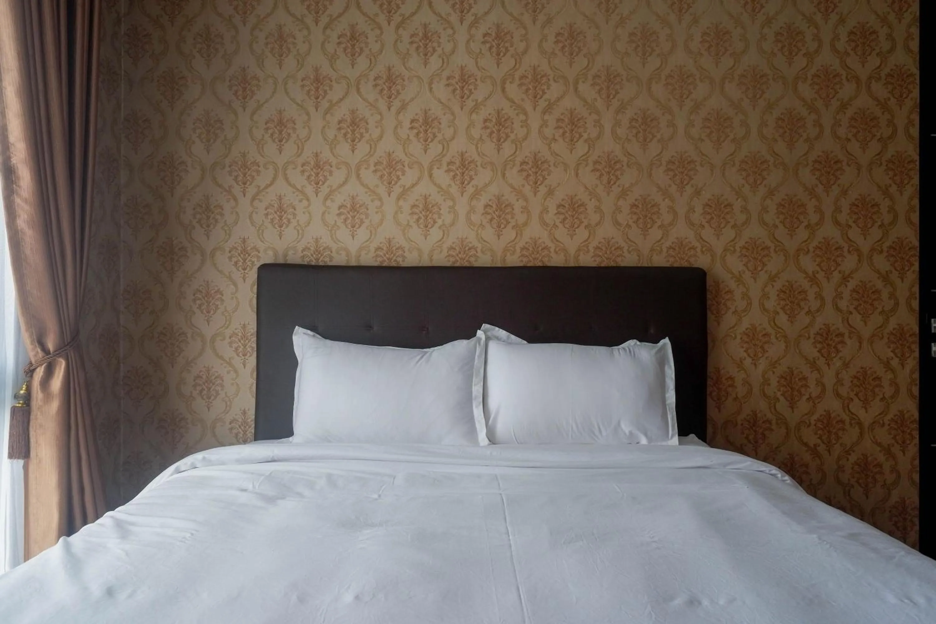 Bedroom, Bed in The Lavana Greenkhaza Villa Jogja