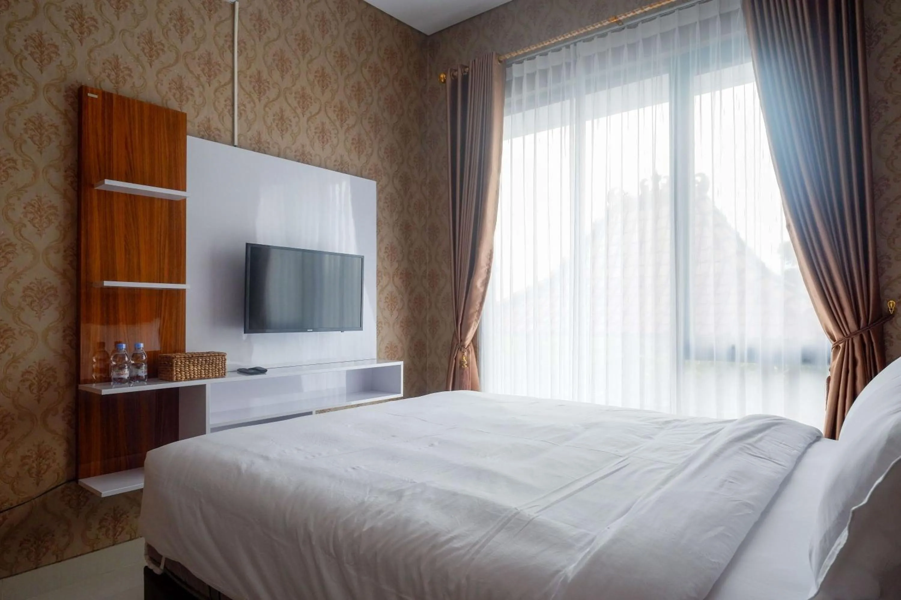 Bedroom, Bed in The Lavana Greenkhaza Villa Jogja