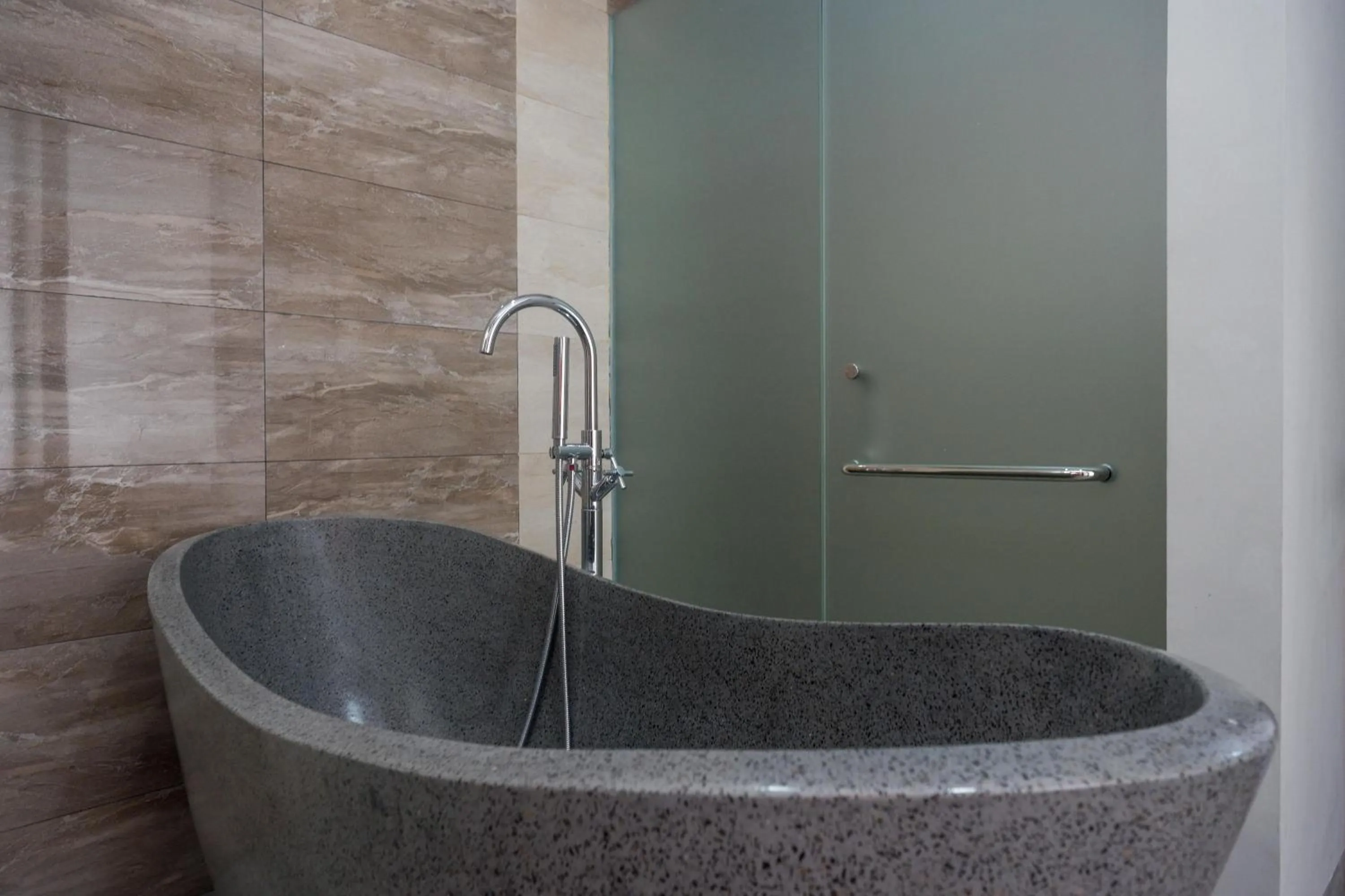 Bathroom in The Lavana Greenkhaza Villa Jogja