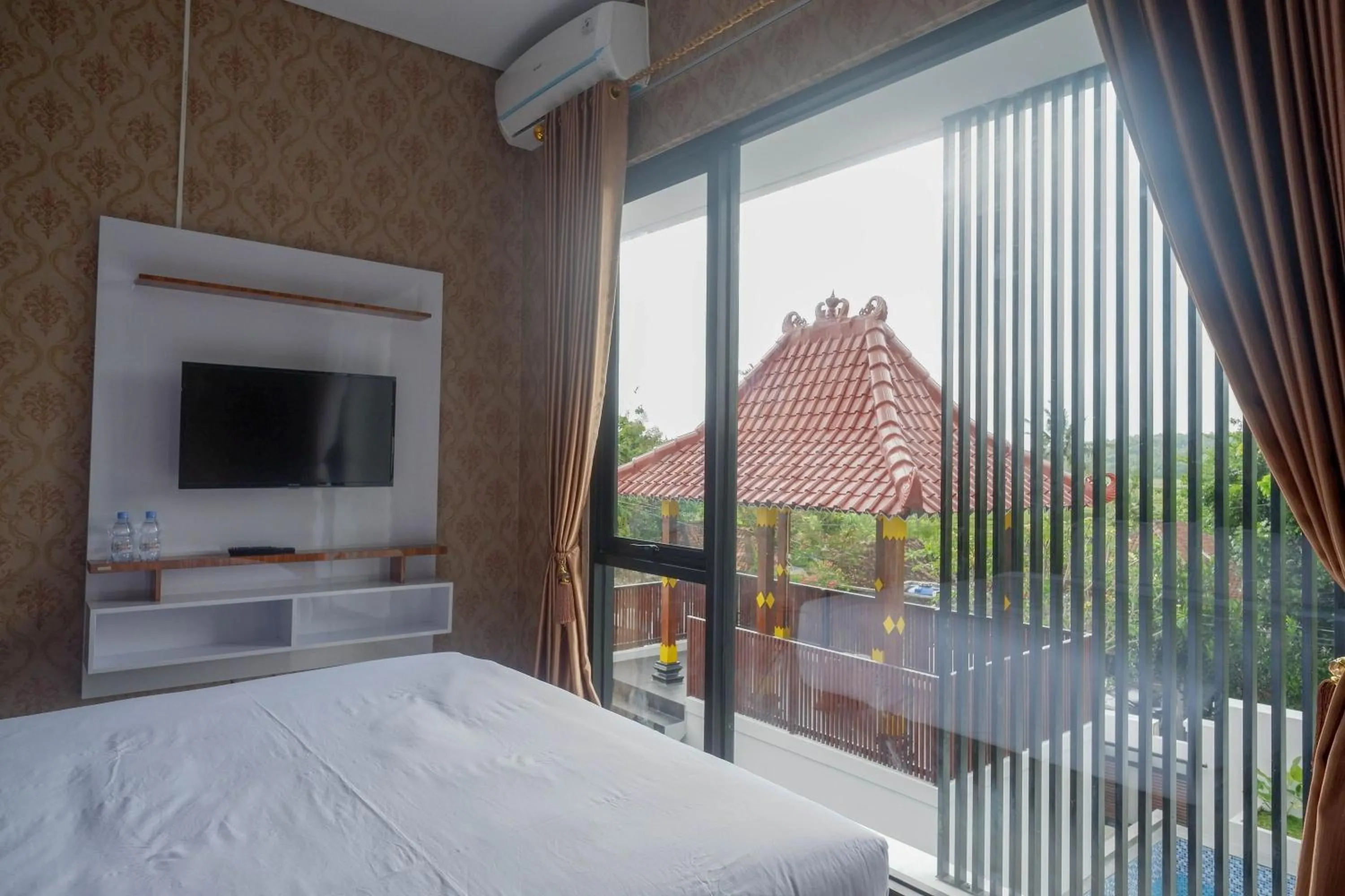 TV and multimedia, Bed in The Lavana Greenkhaza Villa Jogja