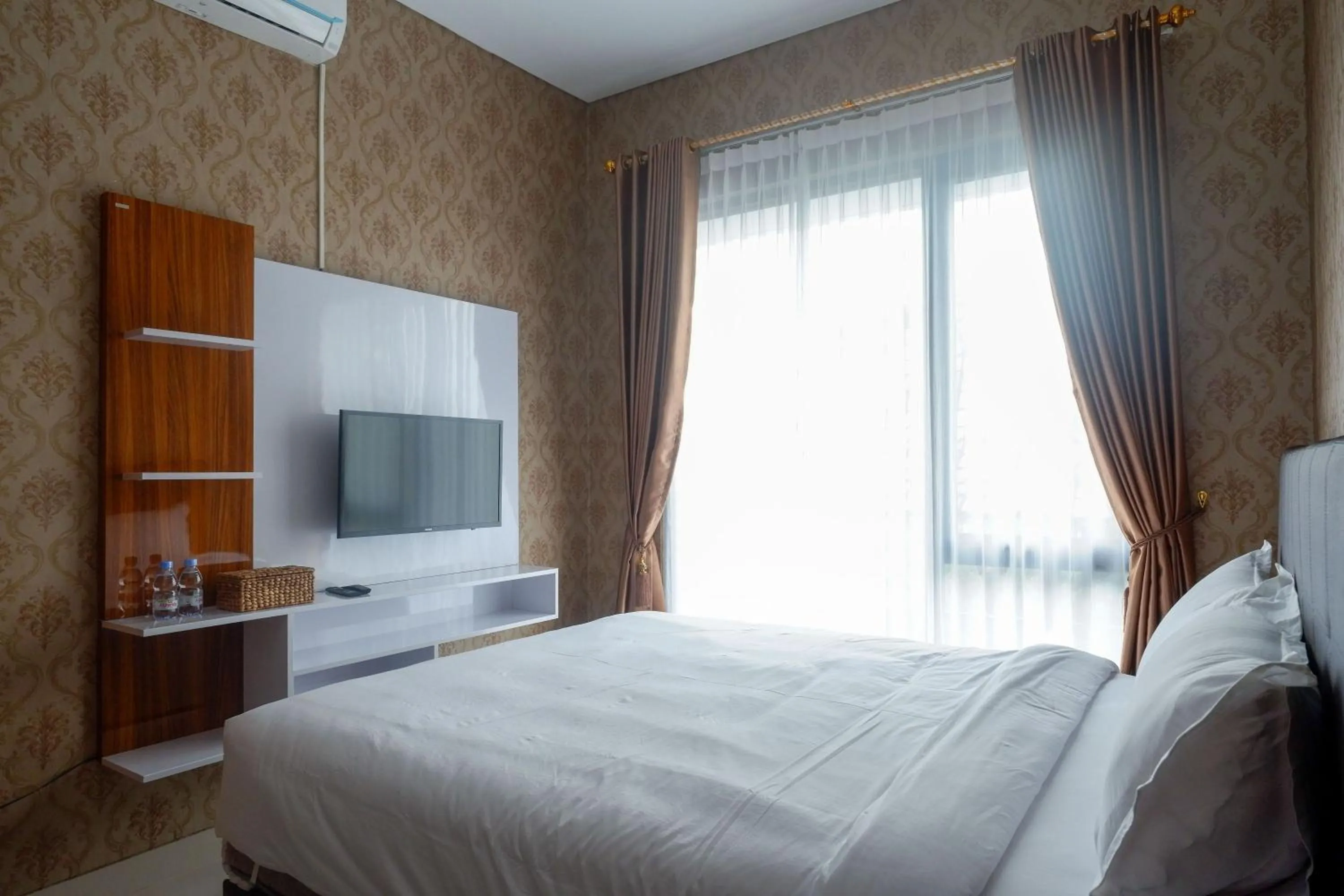 Bedroom, Bed in The Lavana Greenkhaza Villa Jogja