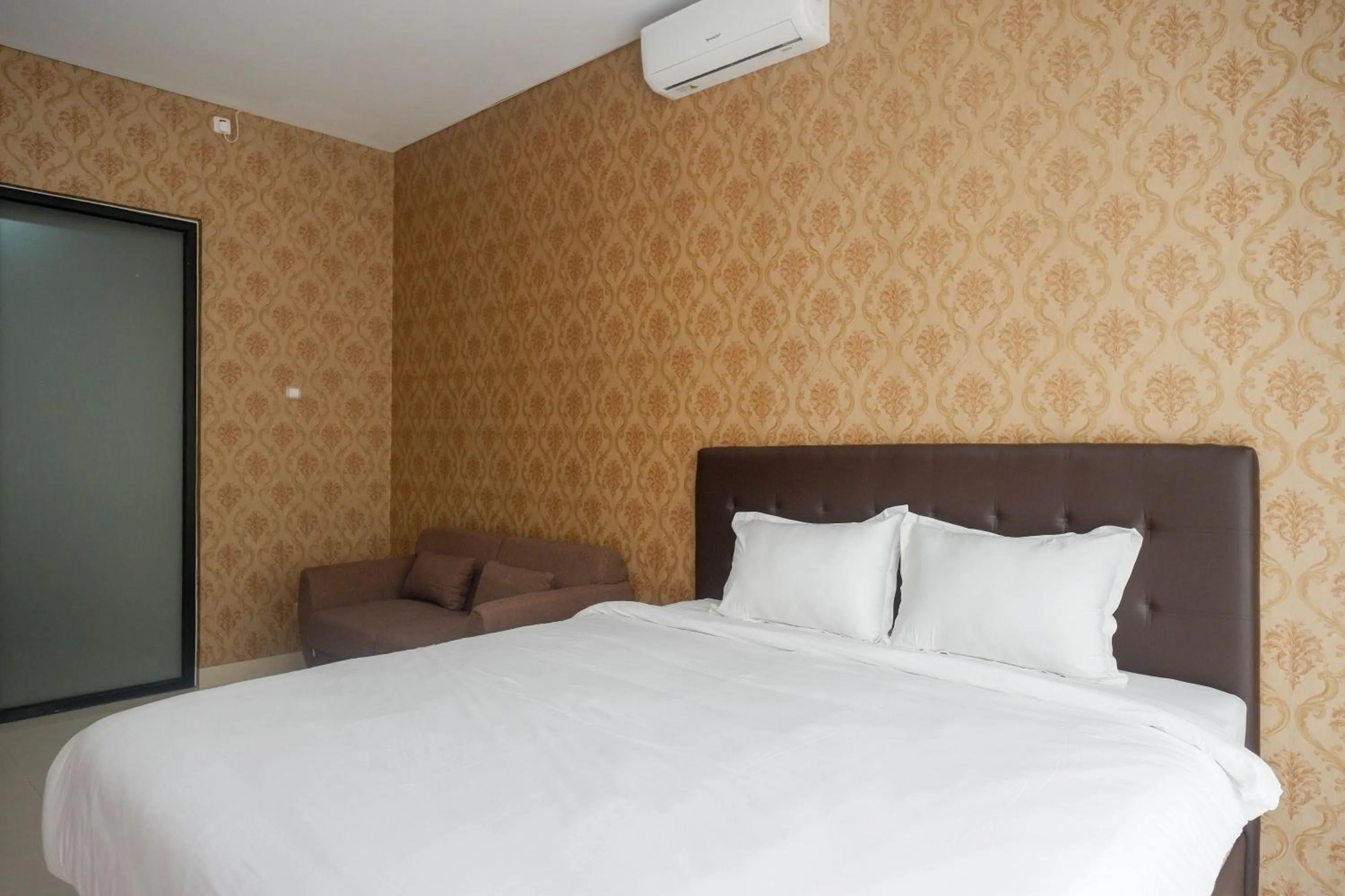 Bedroom, Bed in The Lavana Greenkhaza Villa Jogja