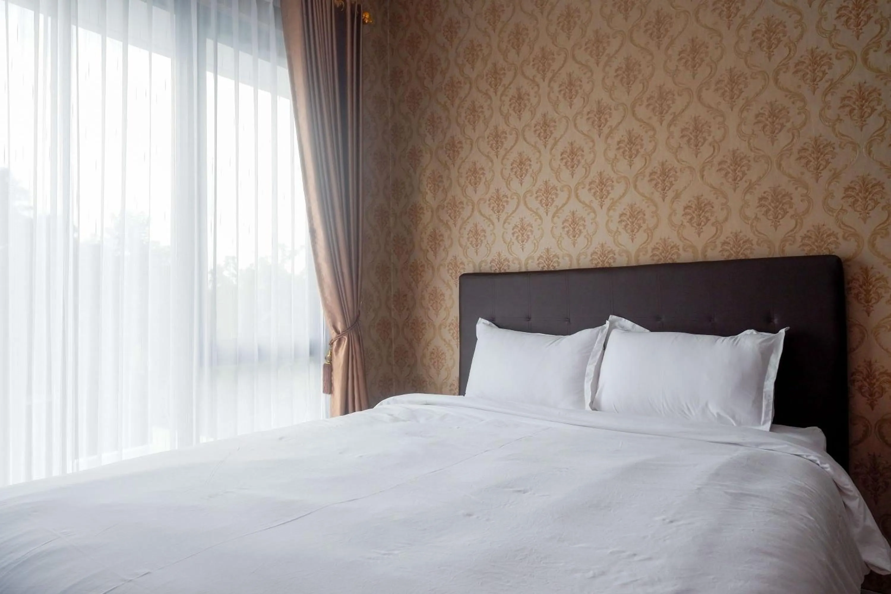 Bedroom, Bed in The Lavana Greenkhaza Villa Jogja