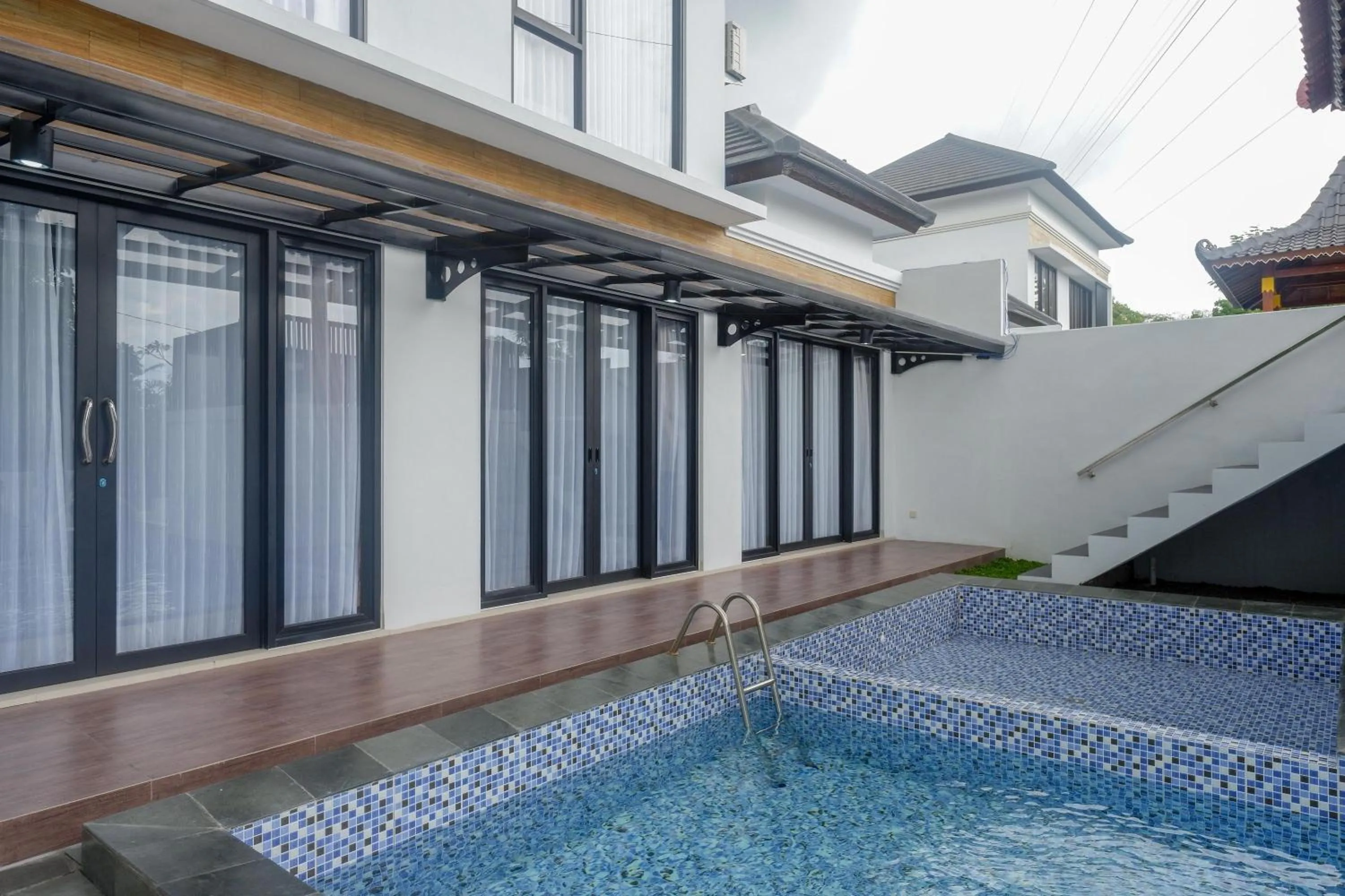 Swimming pool in The Lavana Greenkhaza Villa Jogja
