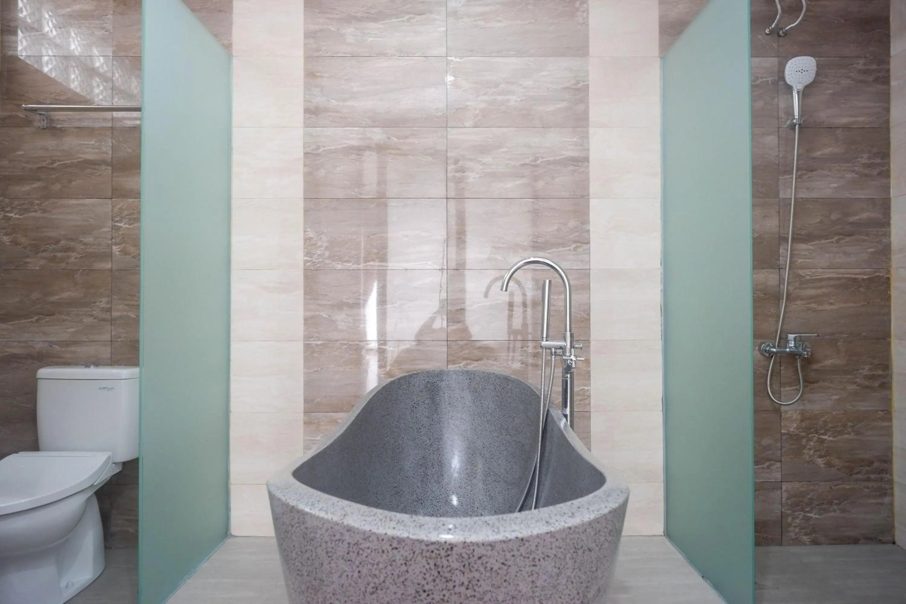 Bathroom in The Lavana Greenkhaza Villa Jogja