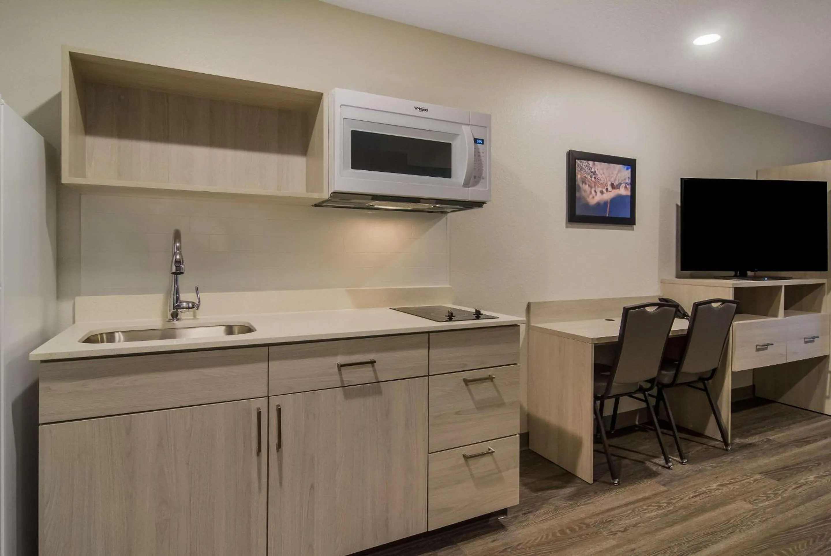 Kitchen or kitchenette in WoodSpring Suites Jacksonville Orange Park