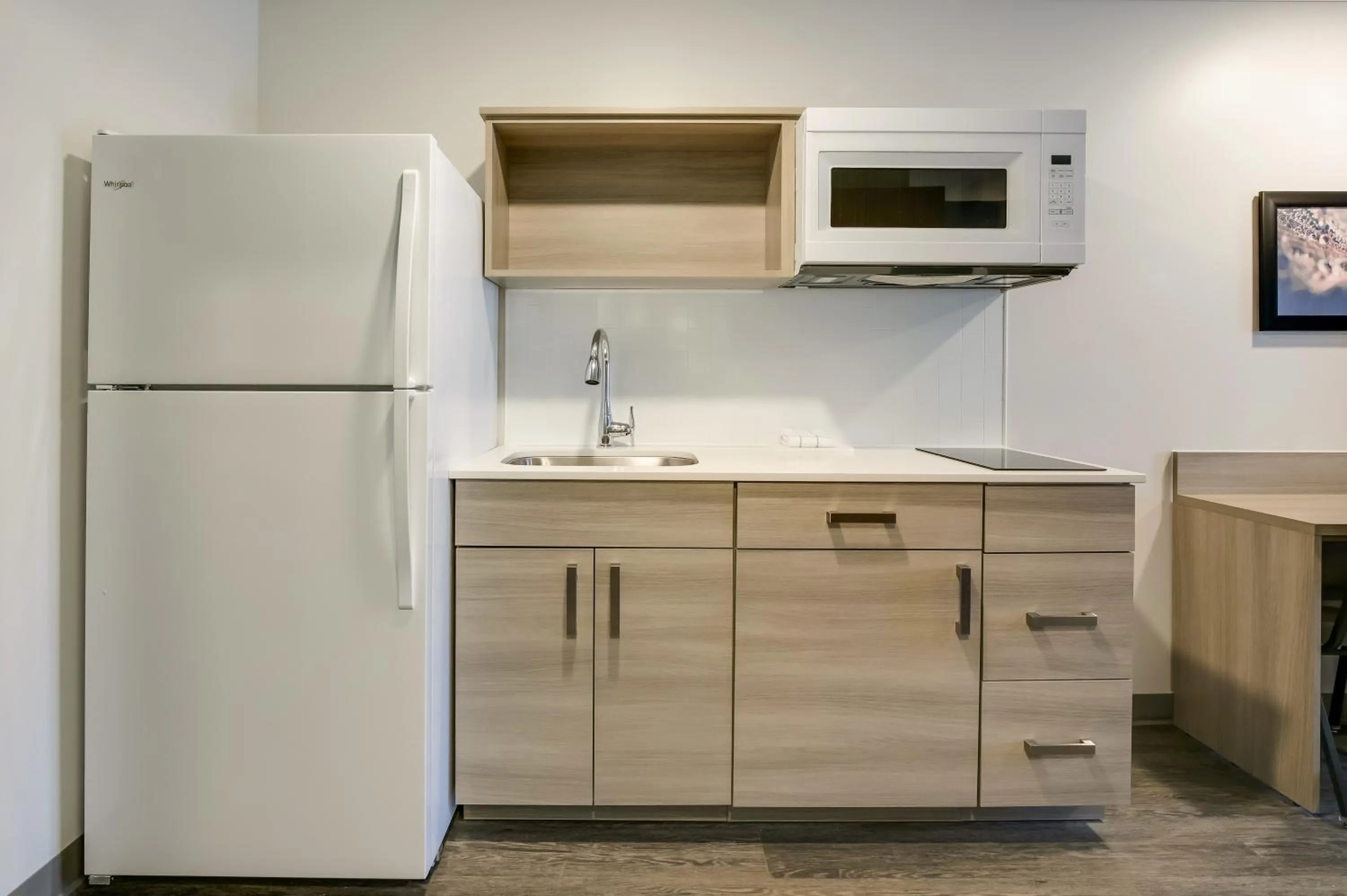 Kitchen or kitchenette in WoodSpring Suites Jacksonville Orange Park