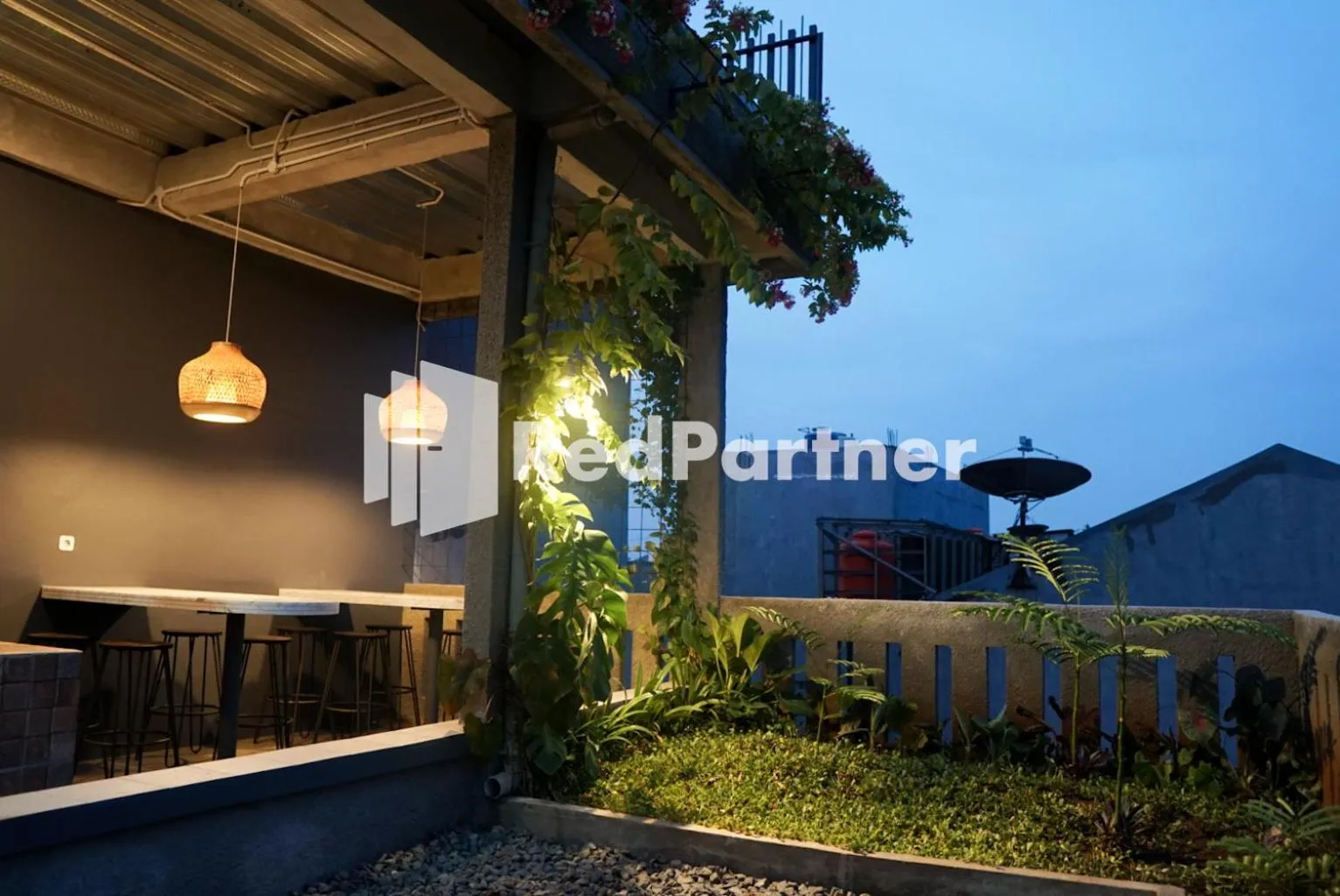 Garden view in Tomang Gelong Guest House Syariah Mitra RedDoorz