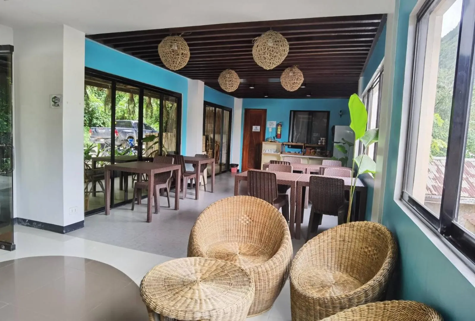 Seating area in Amos Pili Tree Inn powered by Cocotel