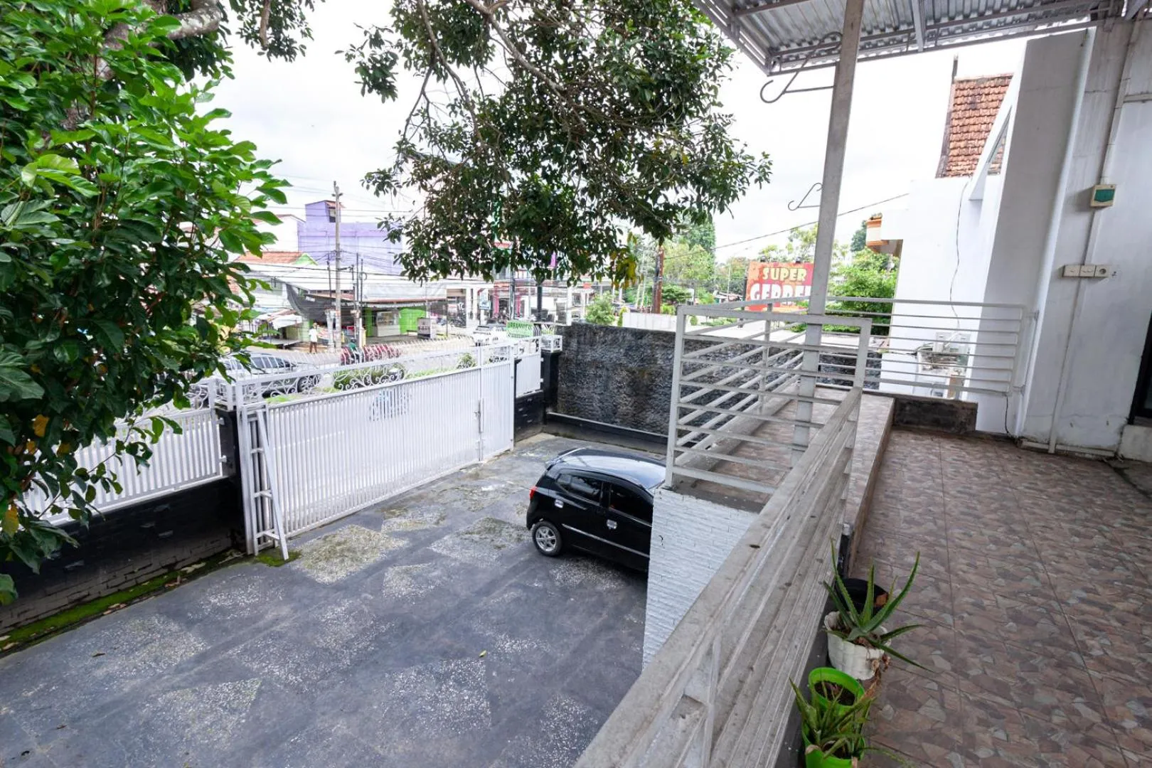 Property building in Urbanview Daniela Jambi by RedDoorz