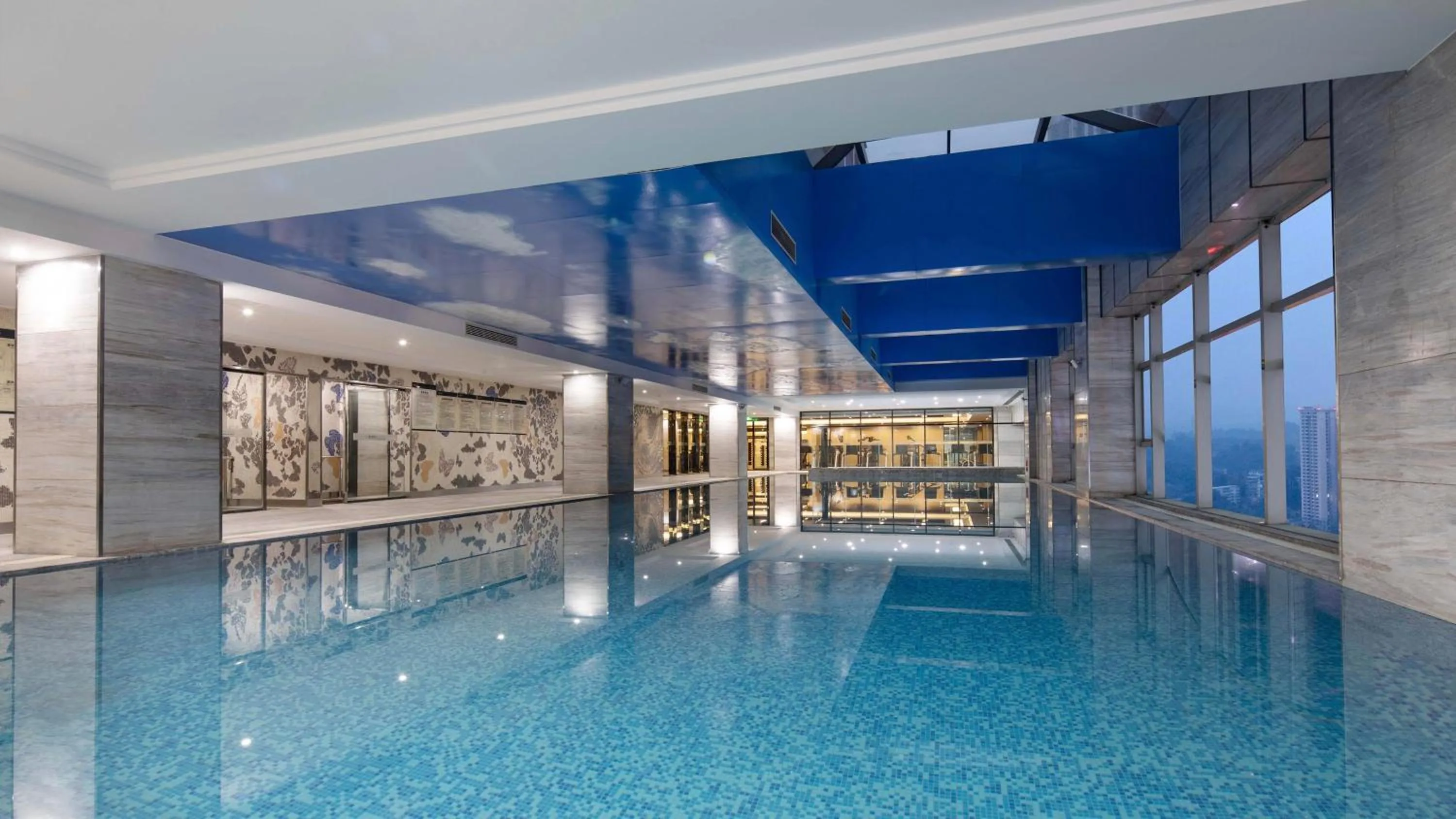 Swimming pool in Hualuxe Leshan, an IHG Hotel