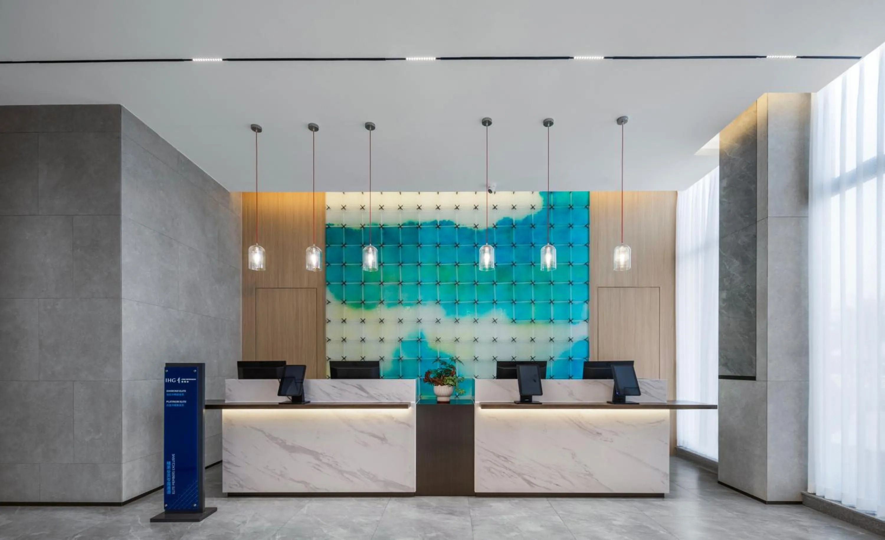 Lobby or reception in Holiday Inn Express Jiangmen Yinhu Bay by IHG