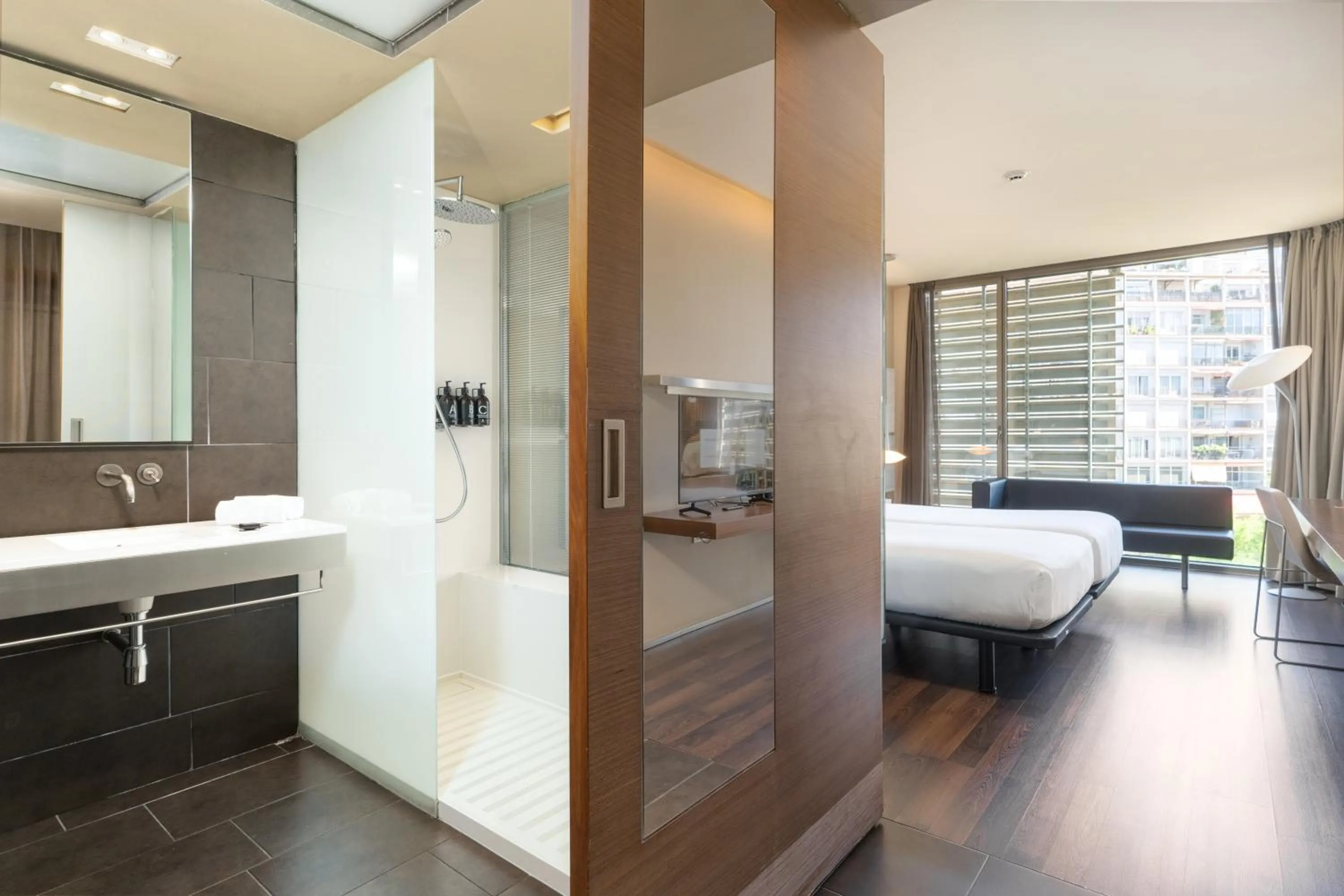 Bathroom, Bed in B Hotel