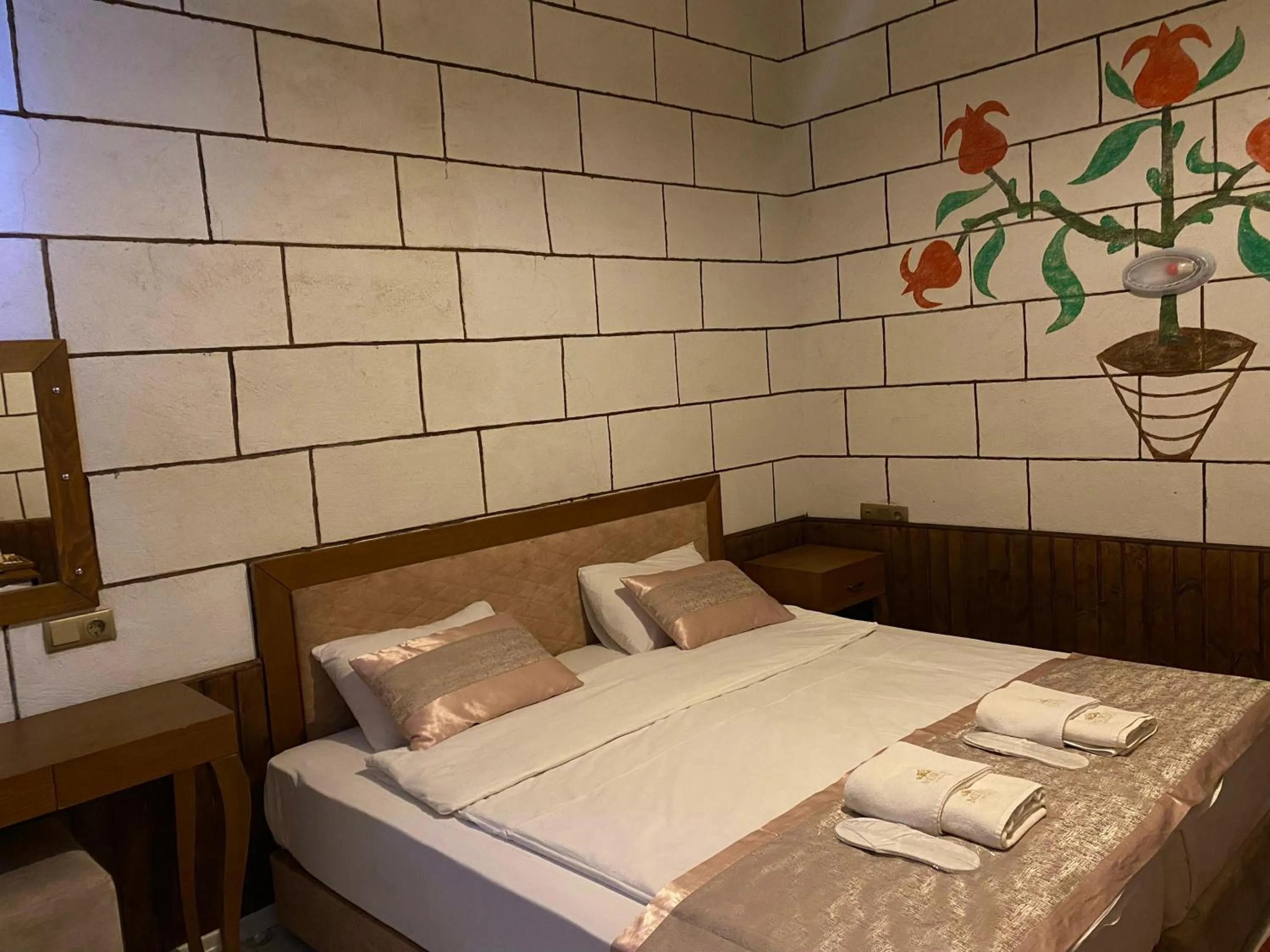 Bed in Mesken Cave Suites