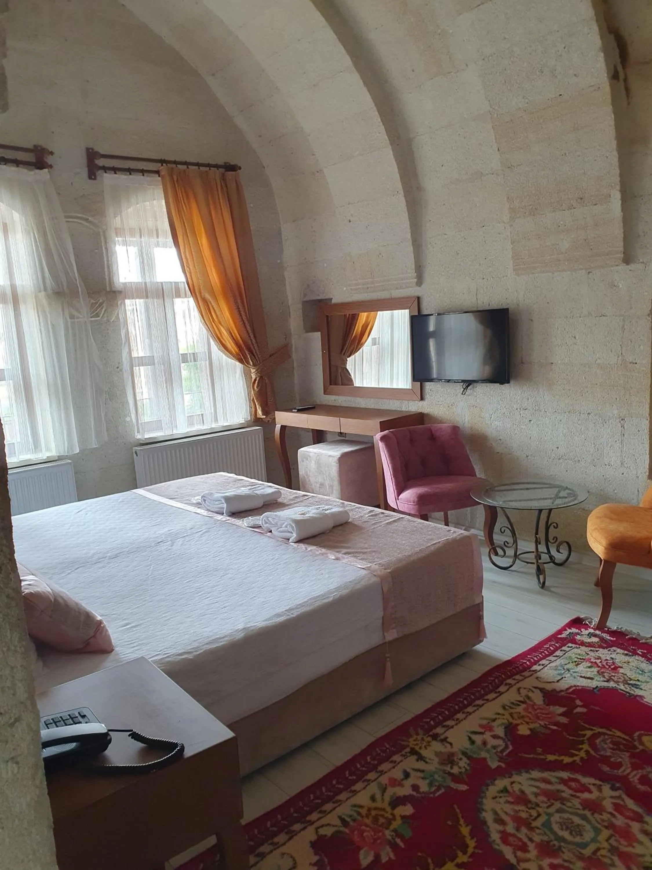 Bed in Mesken Cave Suites