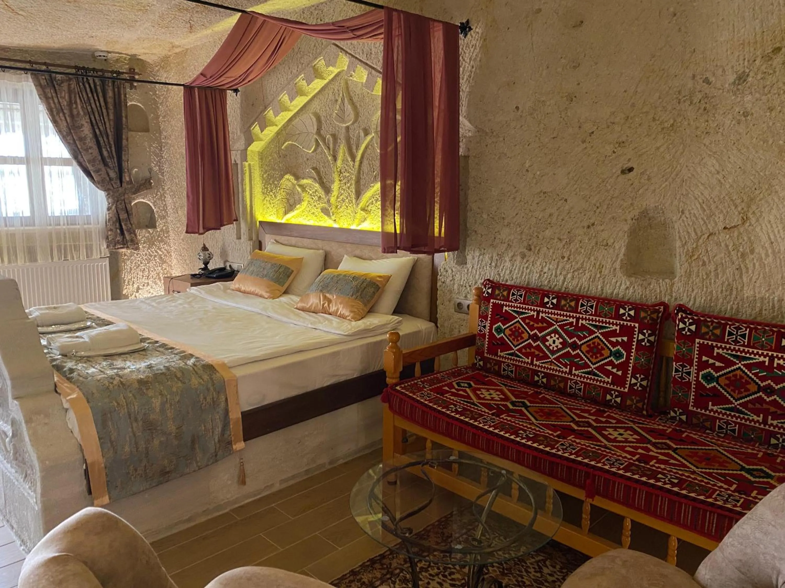 Bed in Mesken Cave Suites