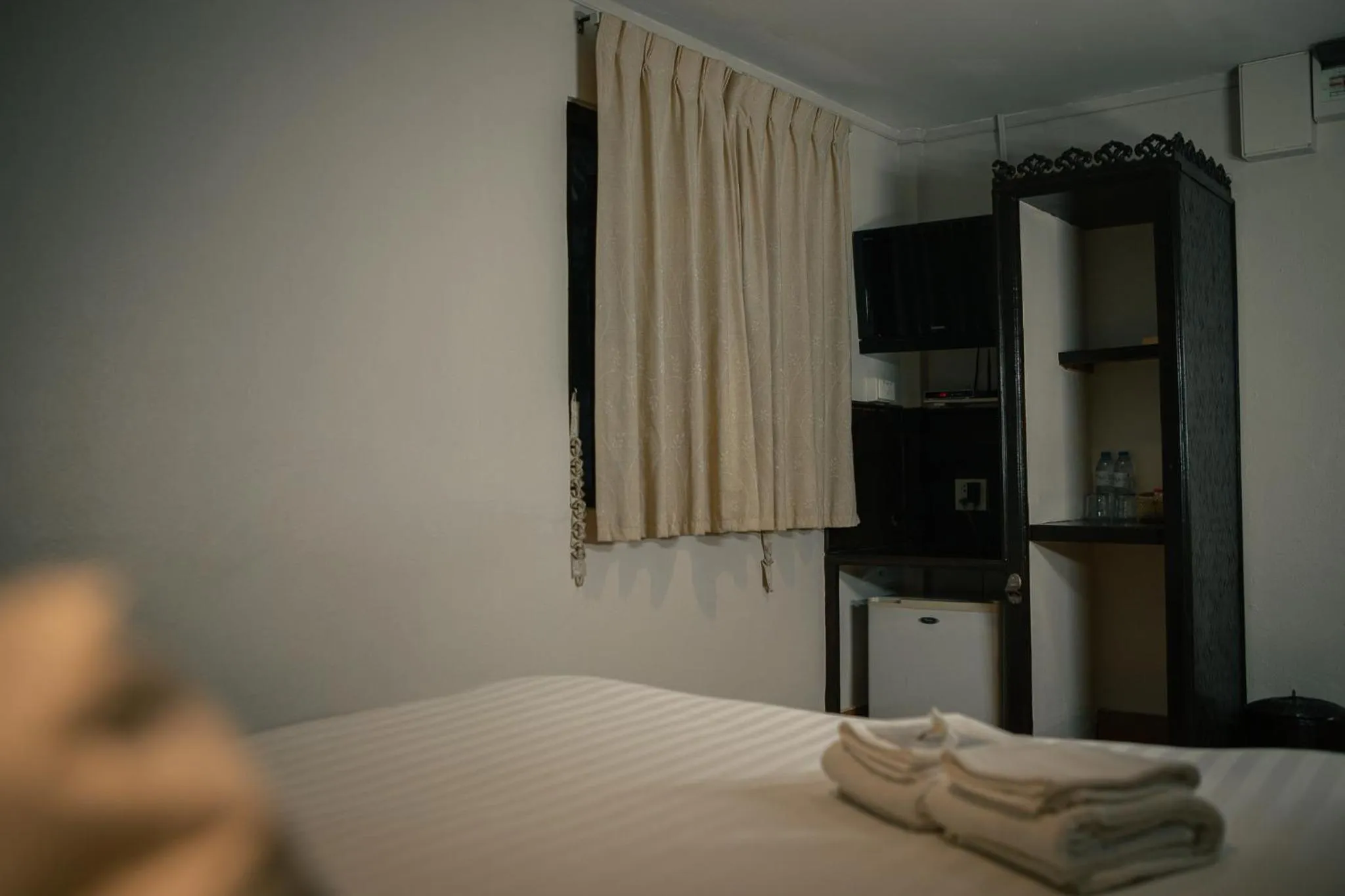 Photo of the whole room, Bed in Pakse hotel & Restaurant