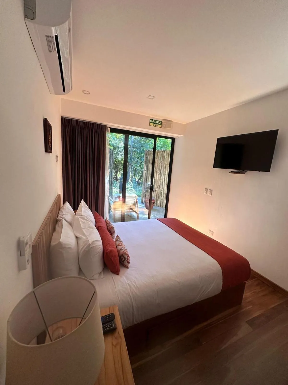 Bed in Suitree Experience Hotel