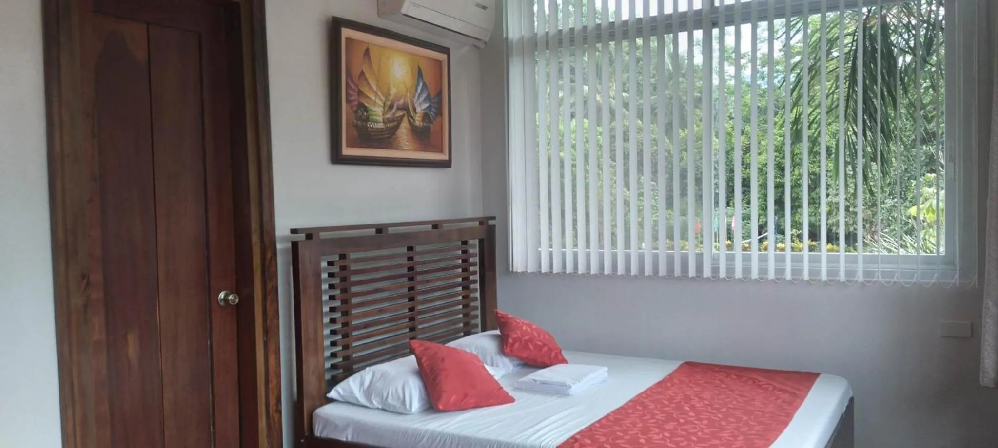 Photo of the whole room, Bed in Camiguin Lanzones Resort