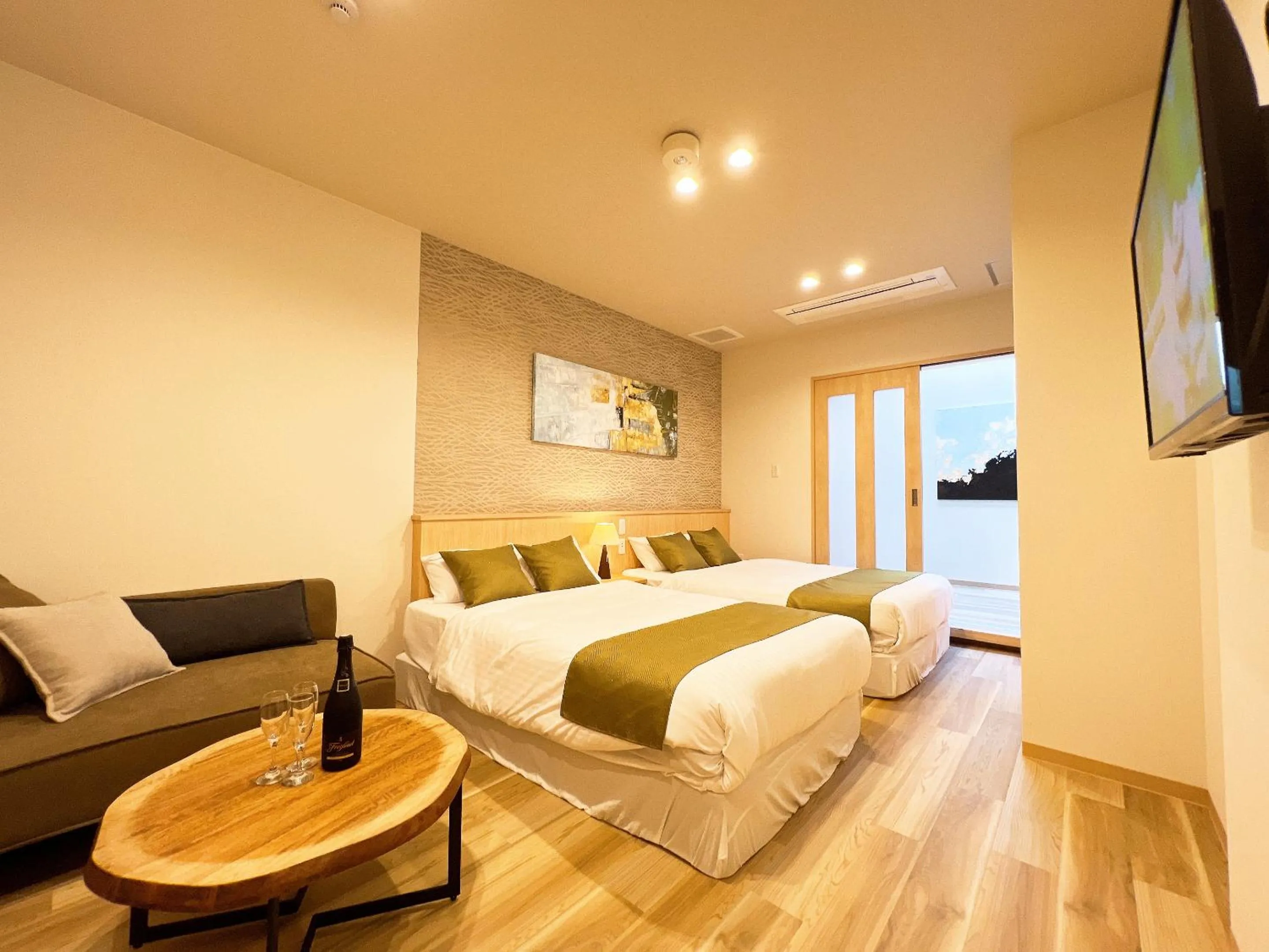 Bed in OWL RESORT ARIFUKU ONSEN