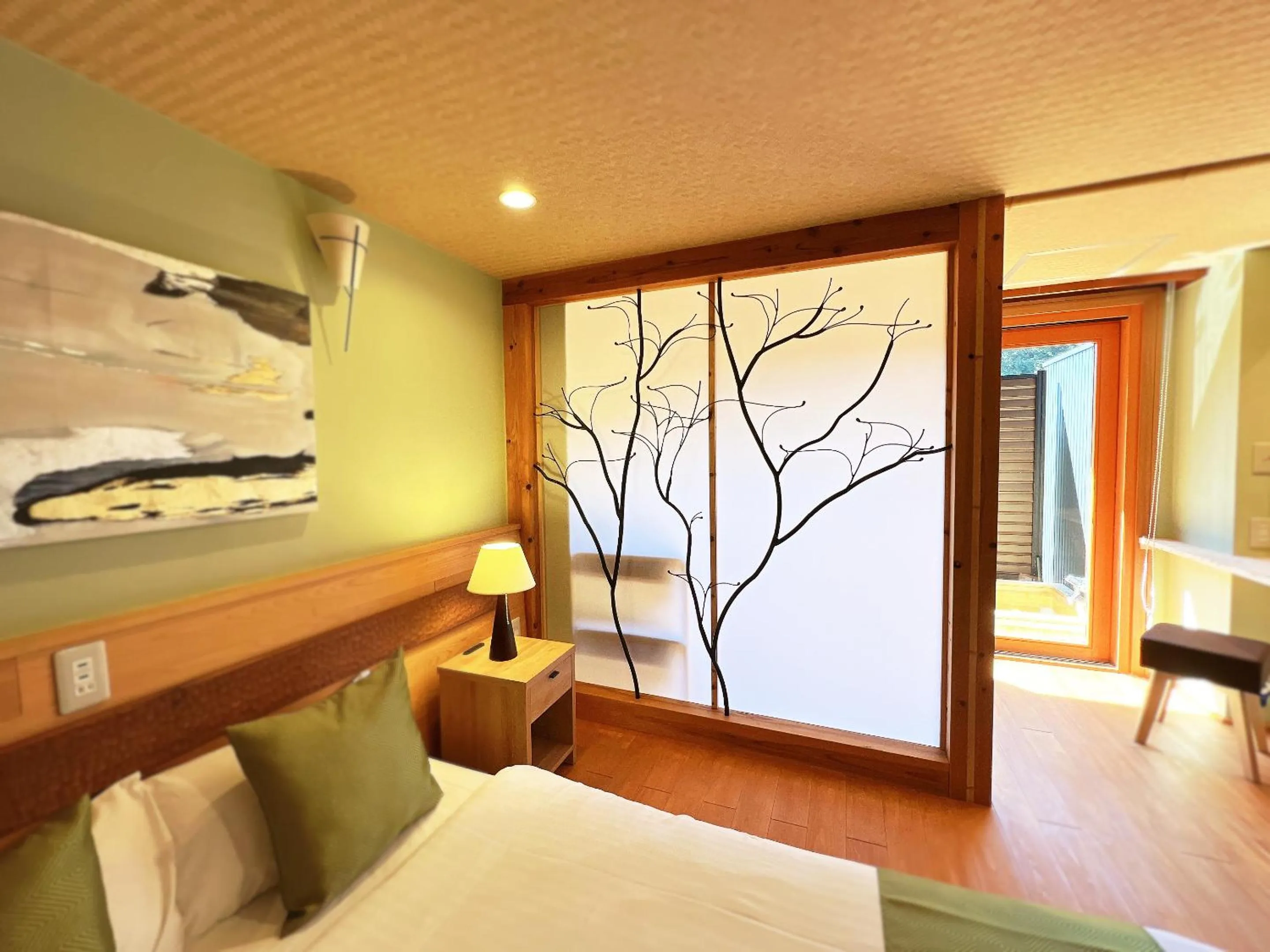 Bed in OWL RESORT ARIFUKU ONSEN