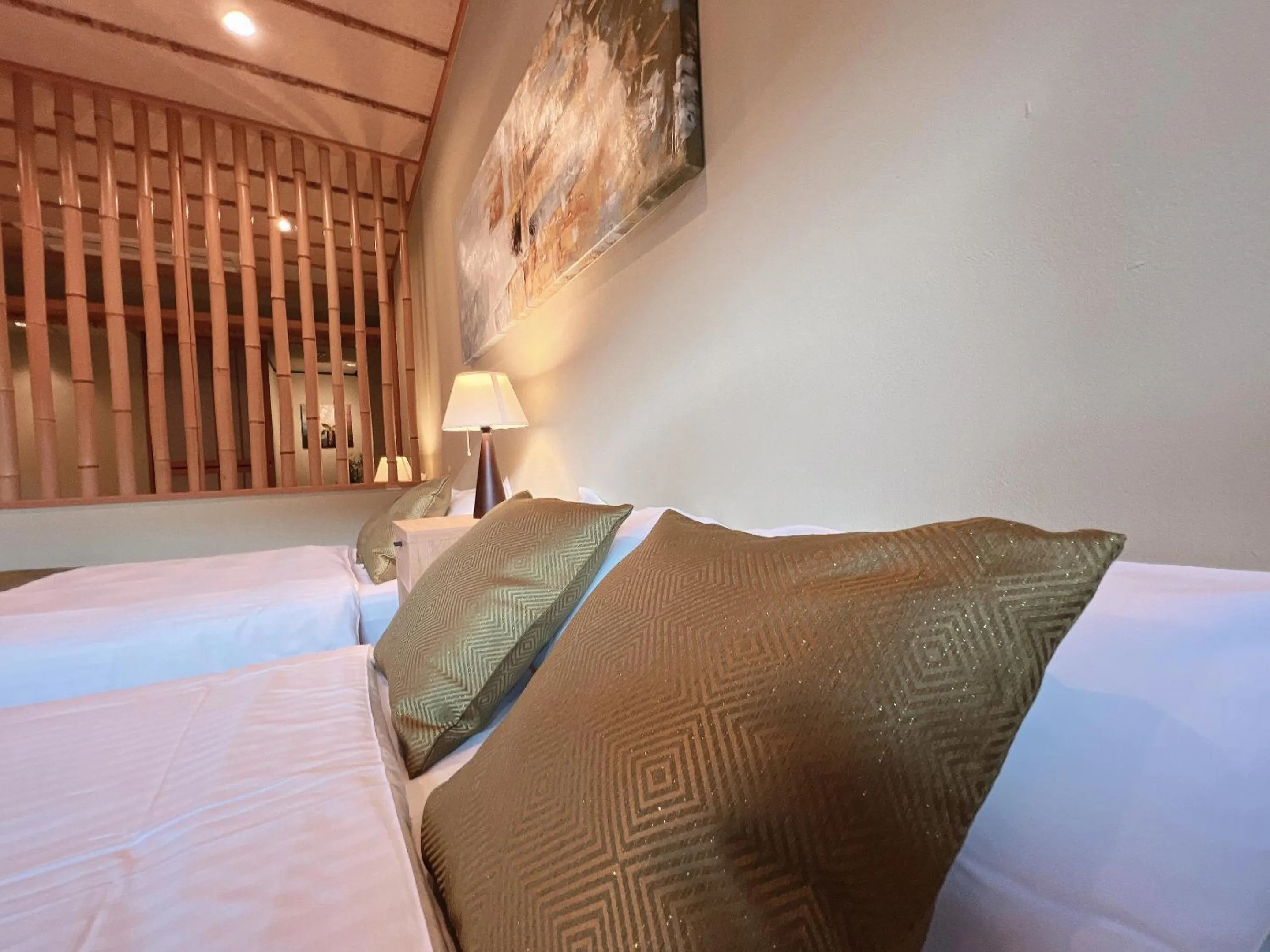 Bed in OWL RESORT ARIFUKU ONSEN