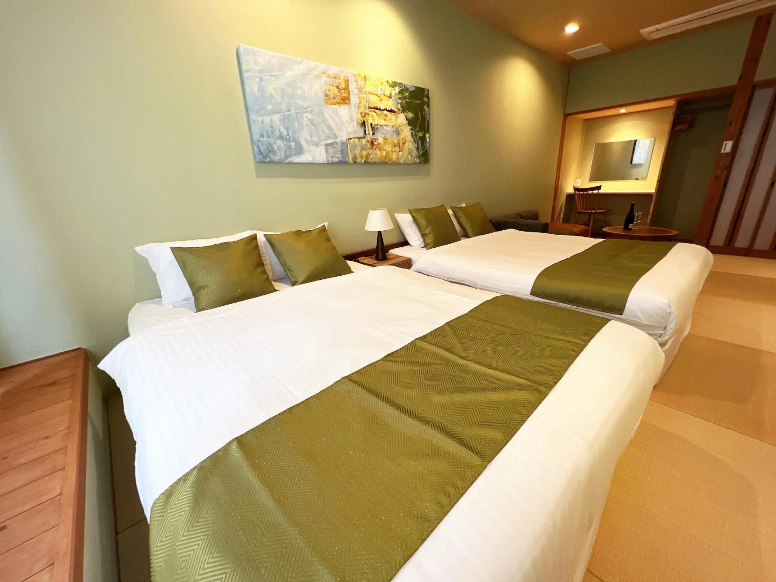 Bed in OWL RESORT ARIFUKU ONSEN