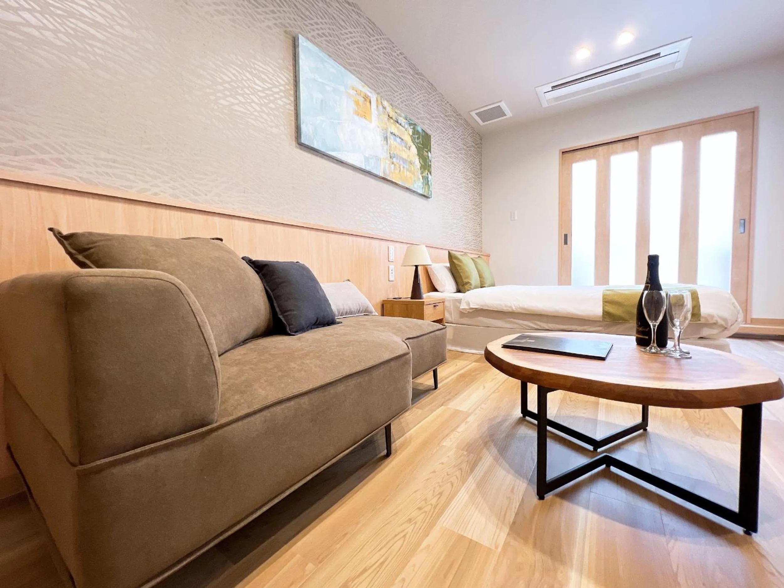 Bed in OWL RESORT ARIFUKU ONSEN