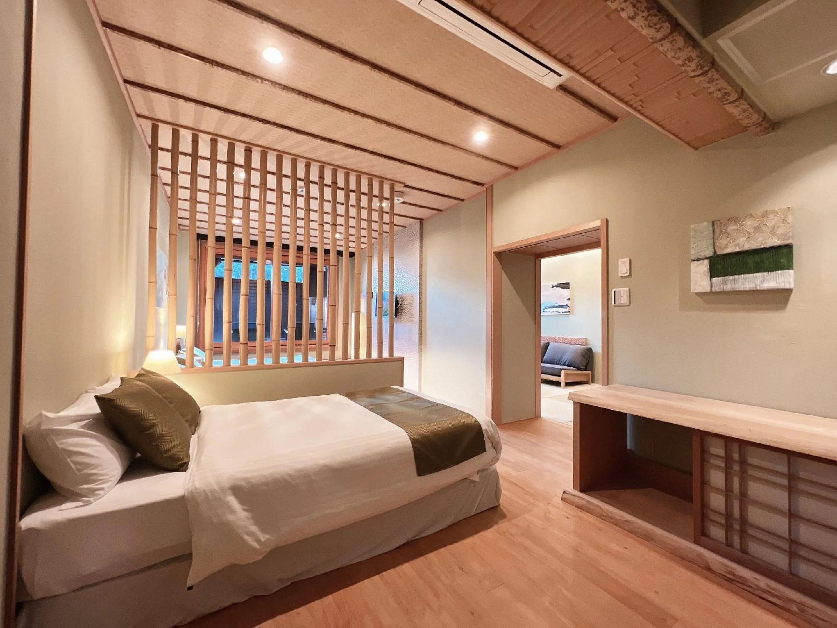 Bed in OWL RESORT ARIFUKU ONSEN