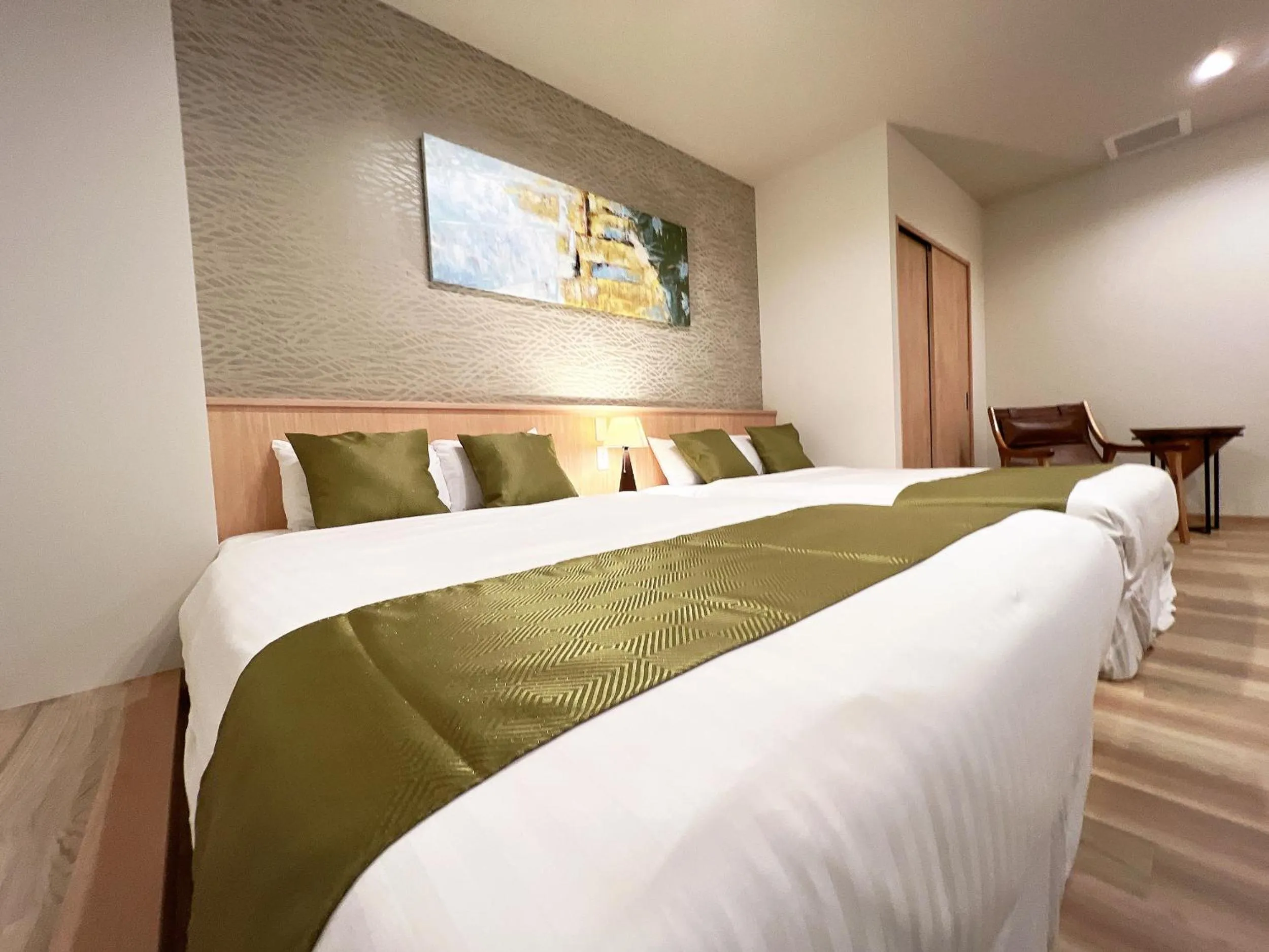 Bed in OWL RESORT ARIFUKU ONSEN