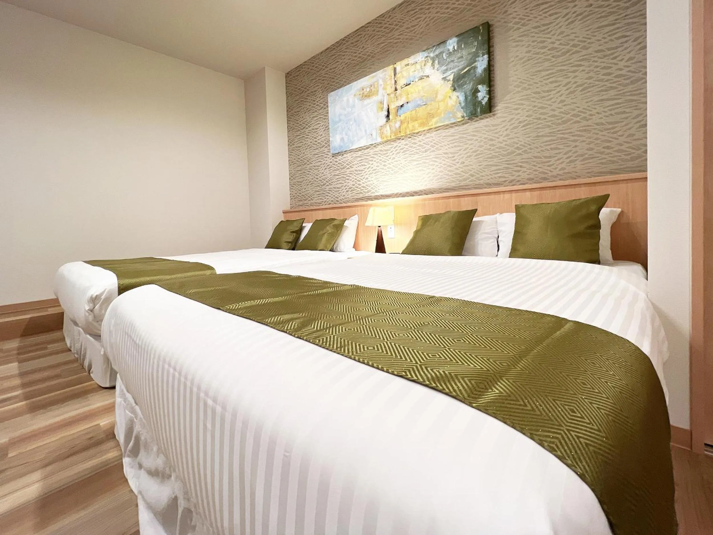 Bed in OWL RESORT ARIFUKU ONSEN