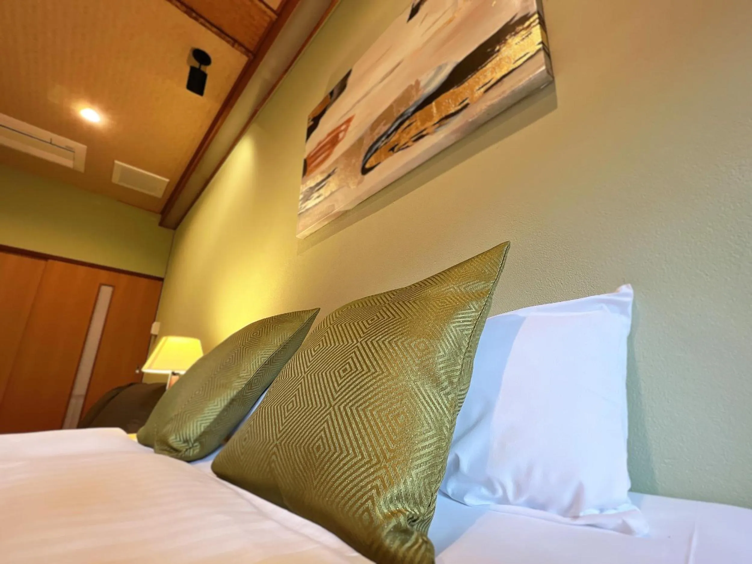 Bed in OWL RESORT ARIFUKU ONSEN