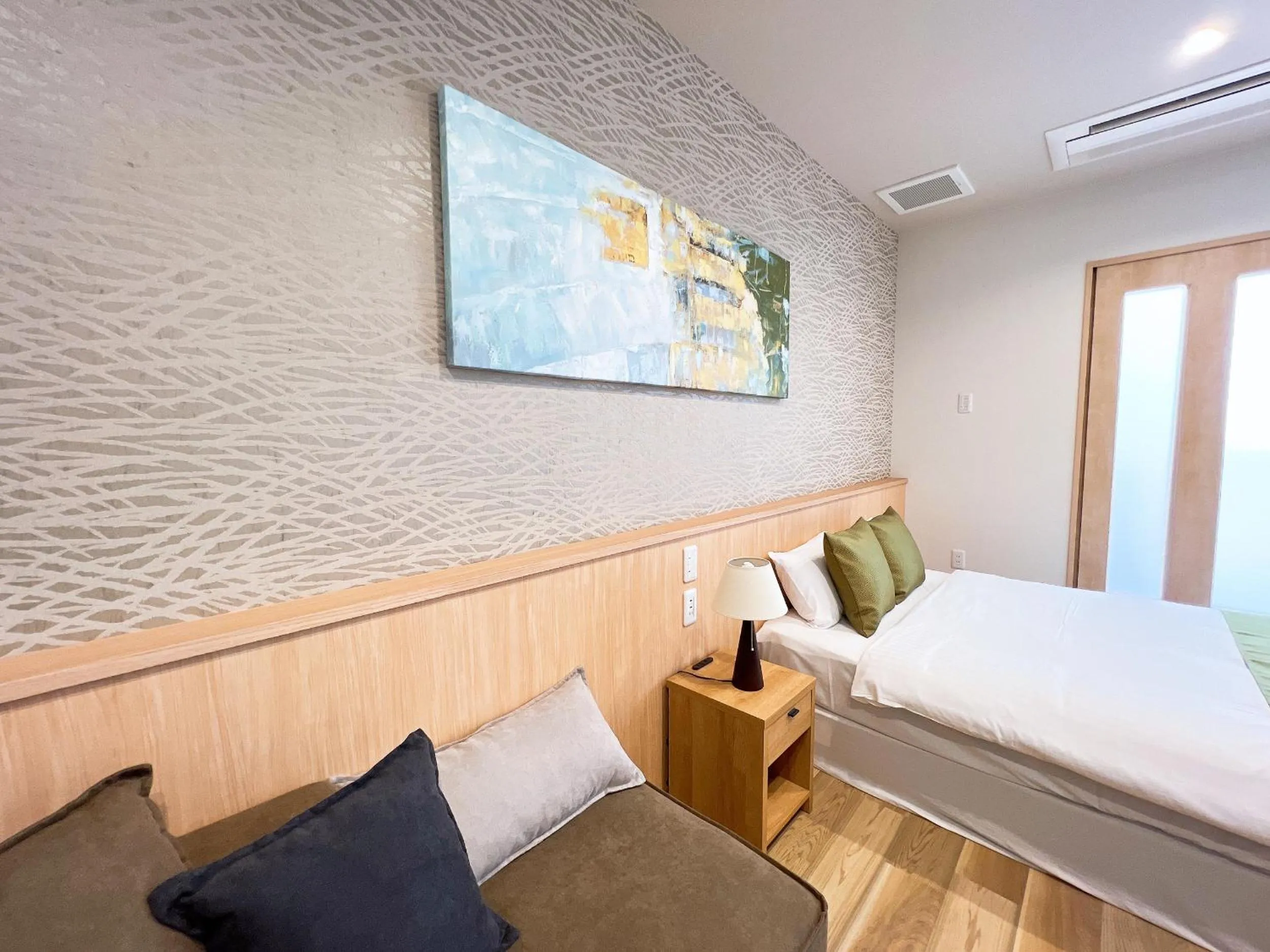 Bed in OWL RESORT ARIFUKU ONSEN