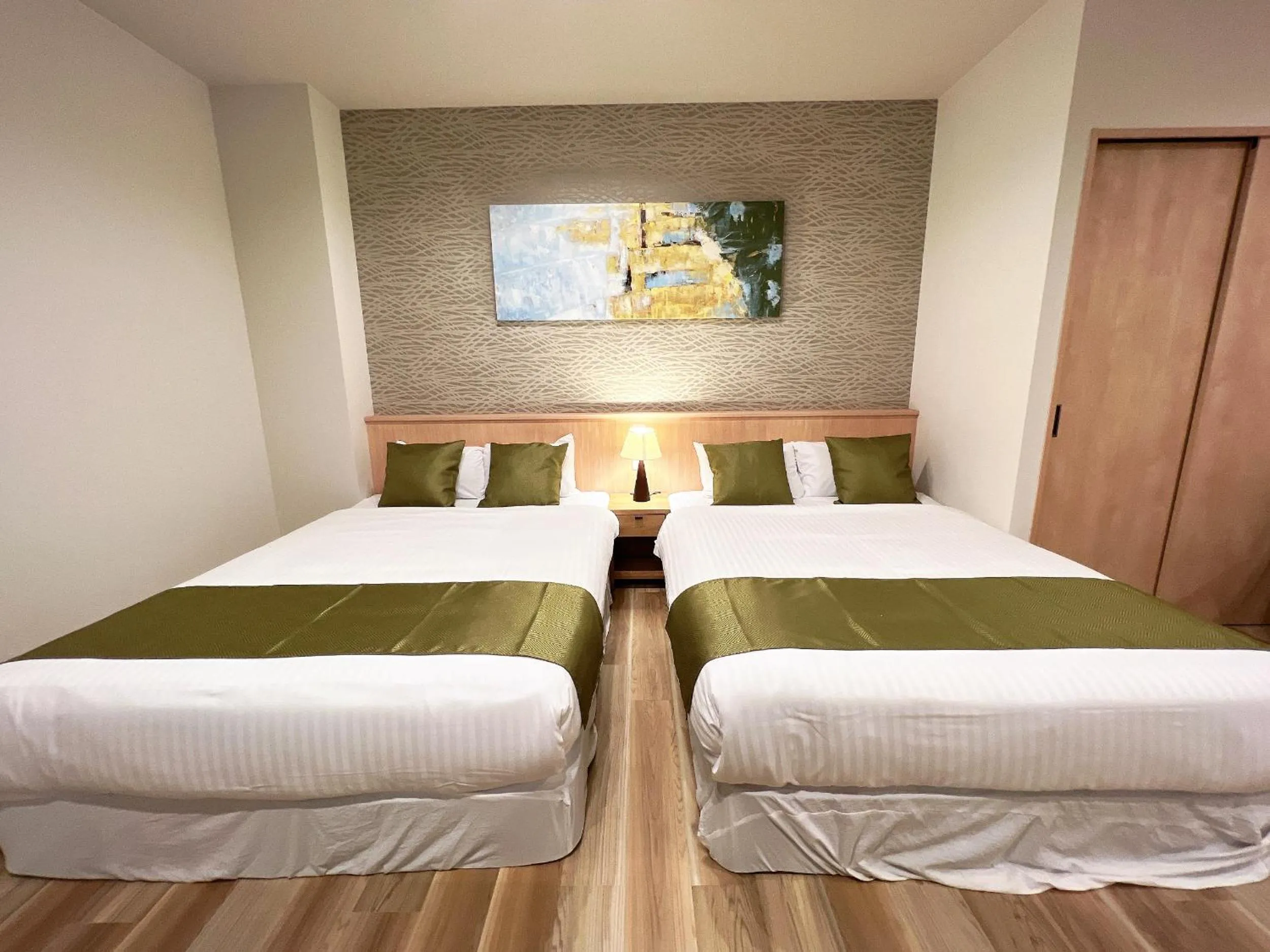 Bed in OWL RESORT ARIFUKU ONSEN