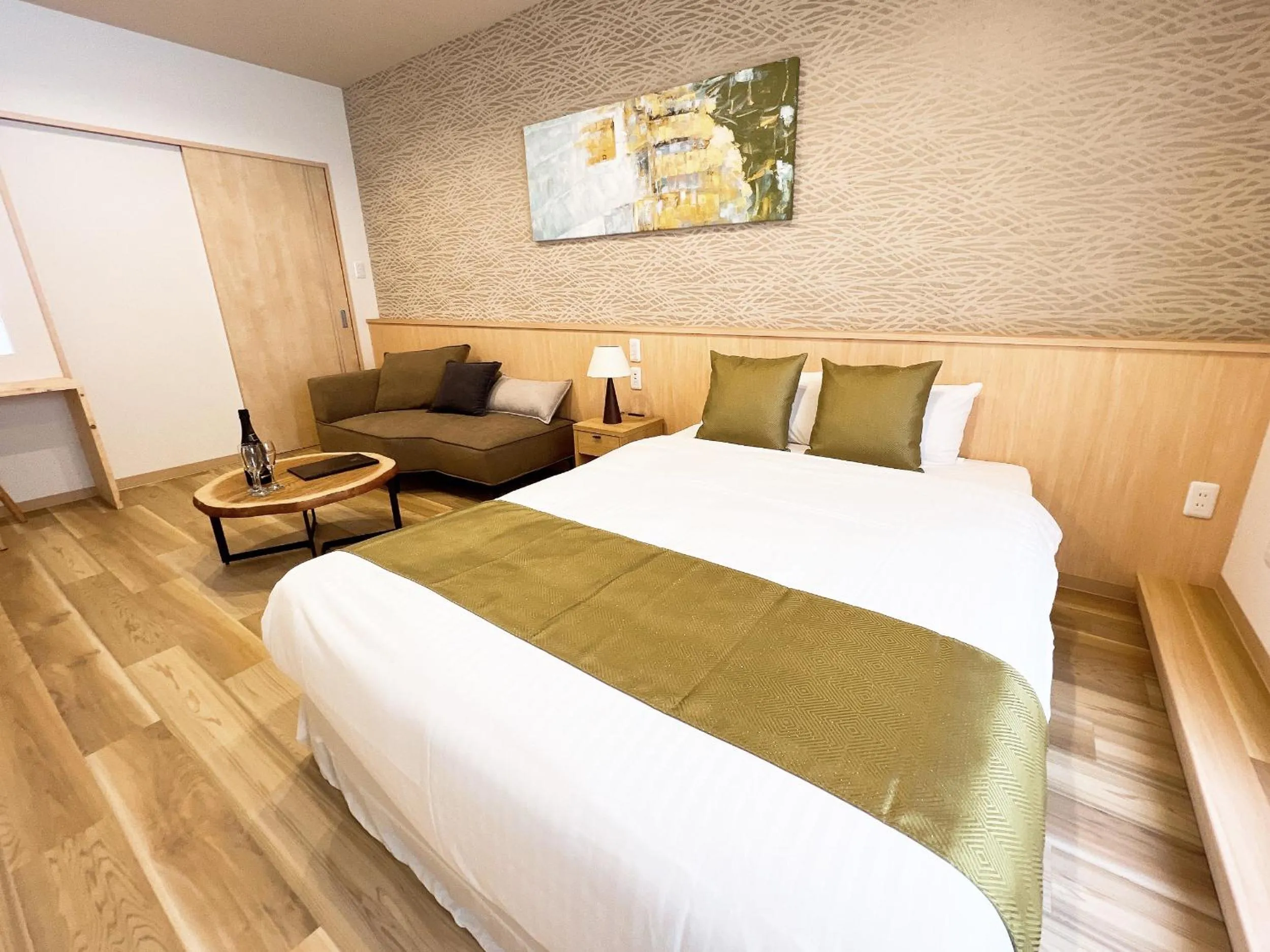 Bed in OWL RESORT ARIFUKU ONSEN