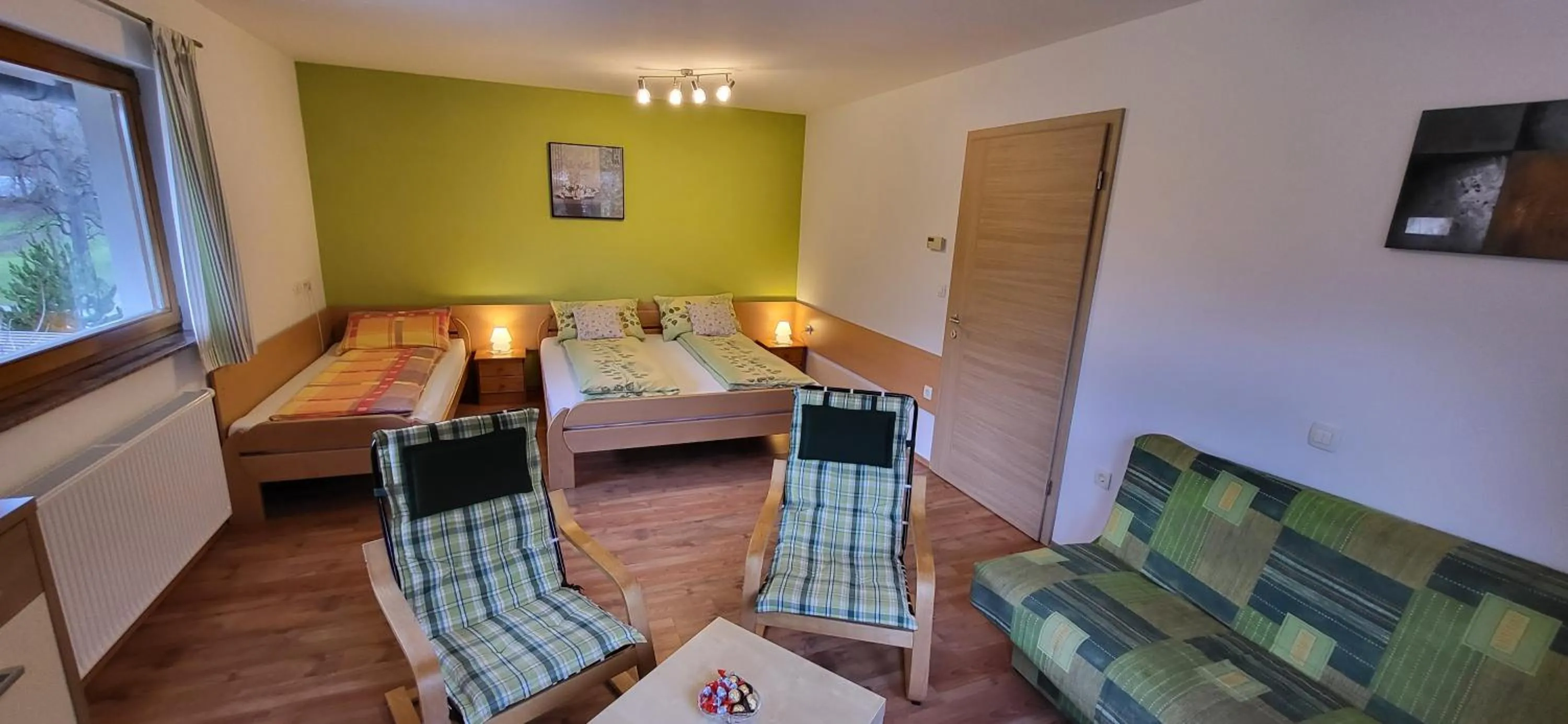 Living room, Bed in Apartments Oman