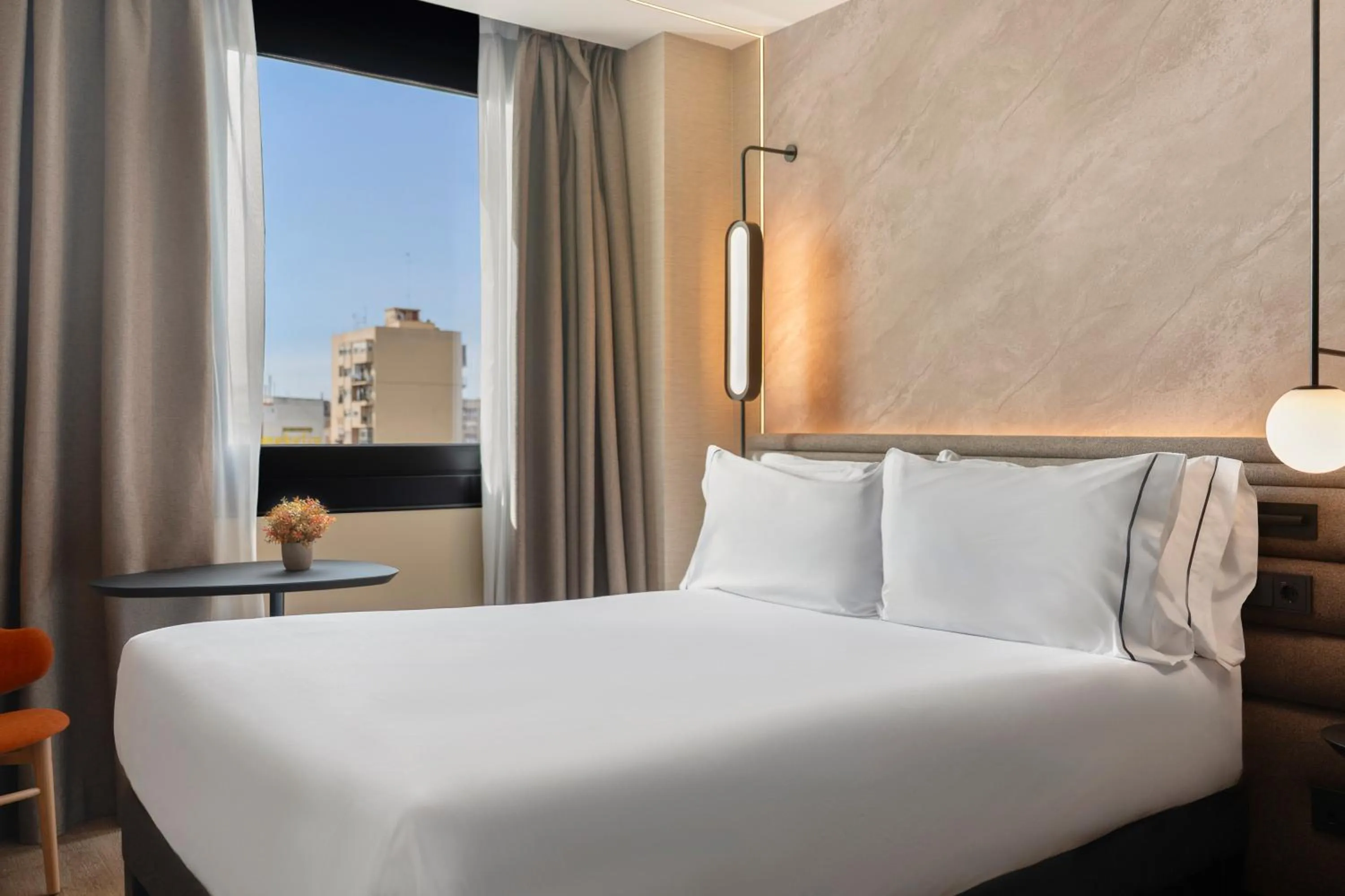 Bed in Novotel Valencia Lavant