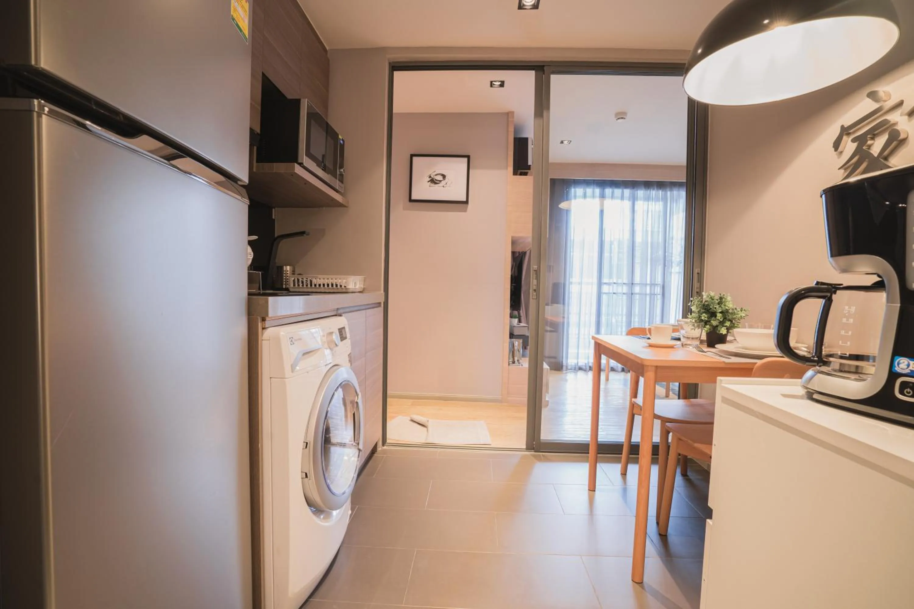 Kitchen or kitchenette in VOQUE Hotel & Serviced Residence Sukhumvit 51