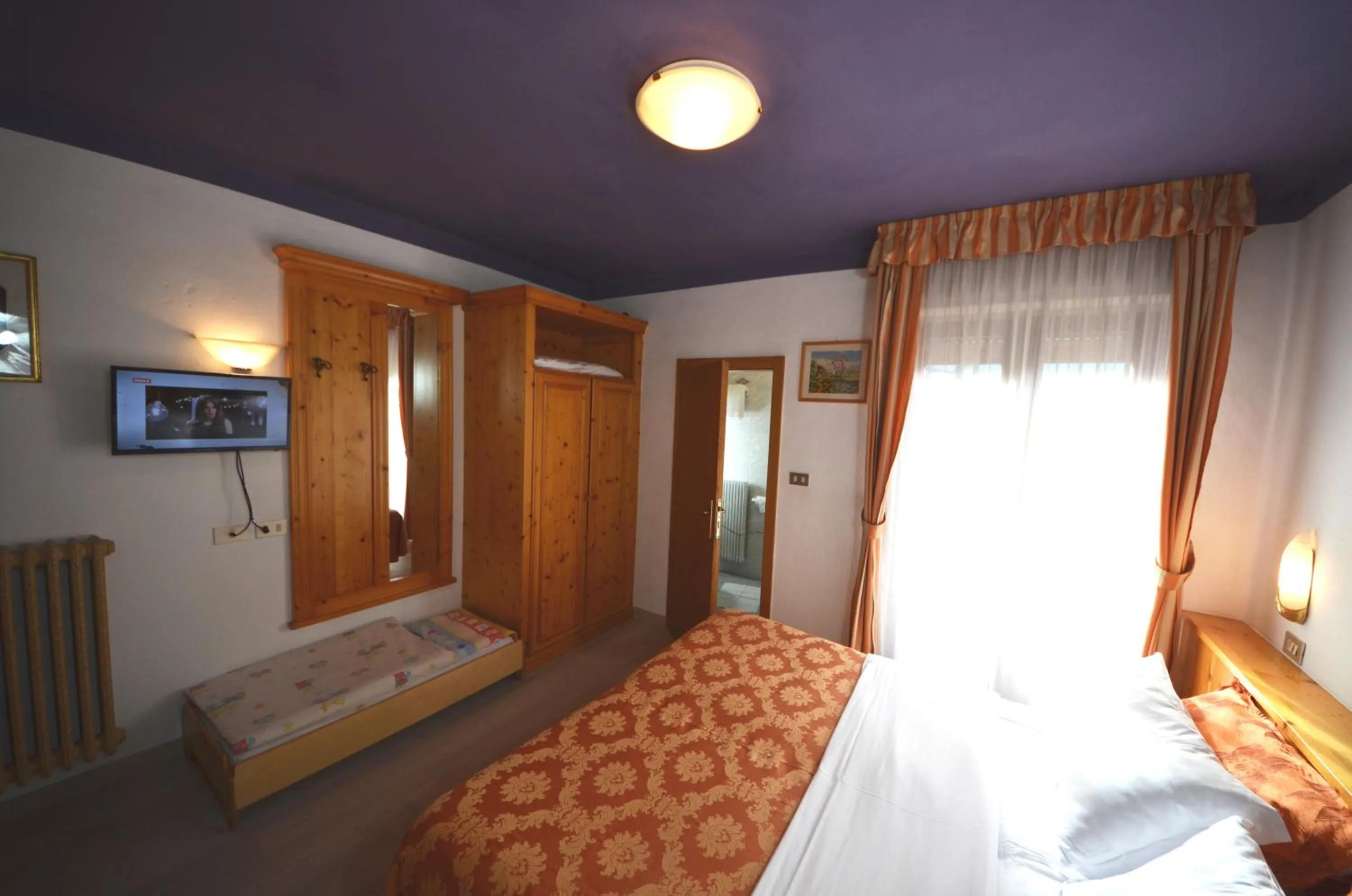 Bed in Family Hotel Primavera