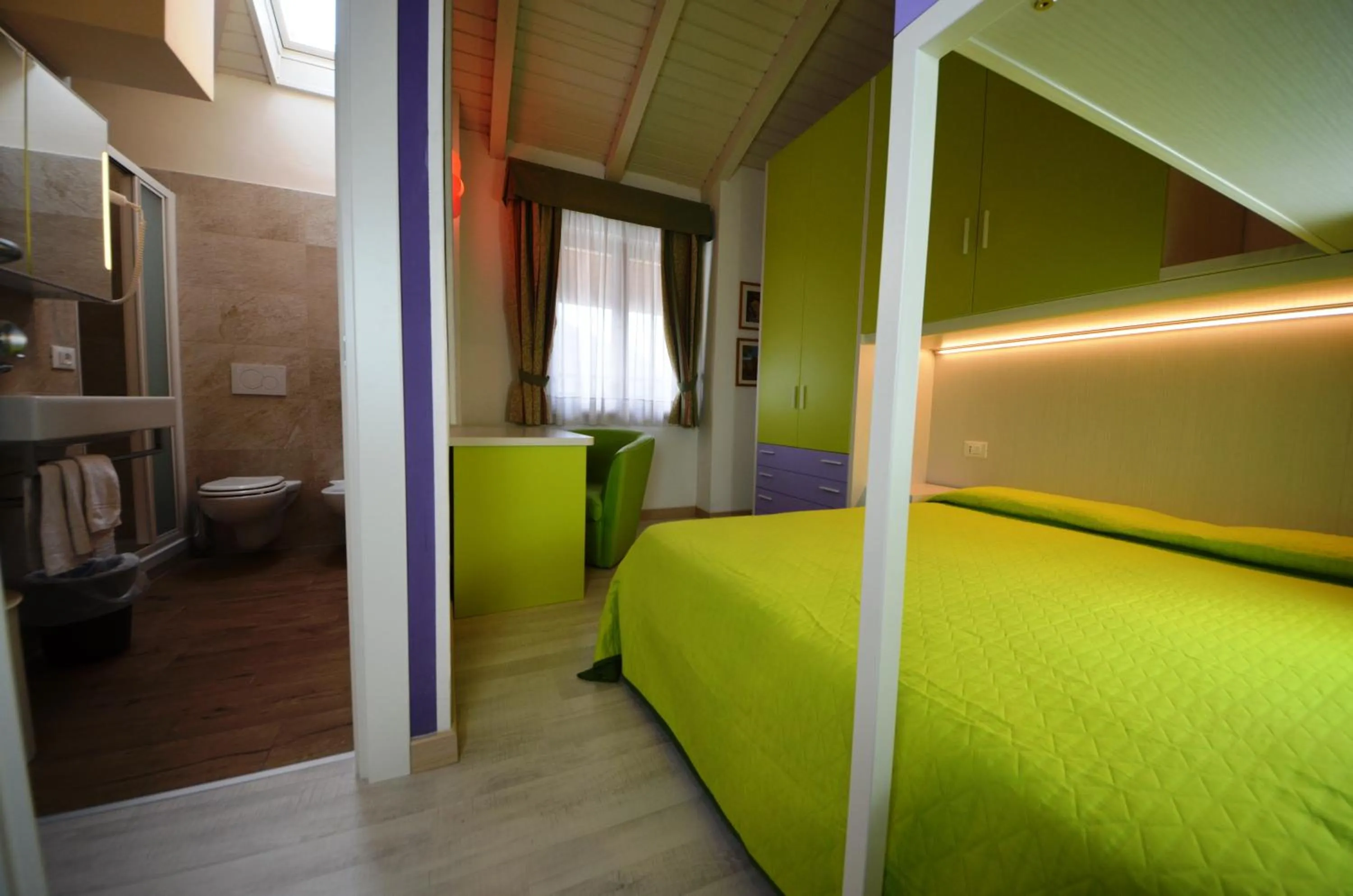 Bed in Family Hotel Primavera