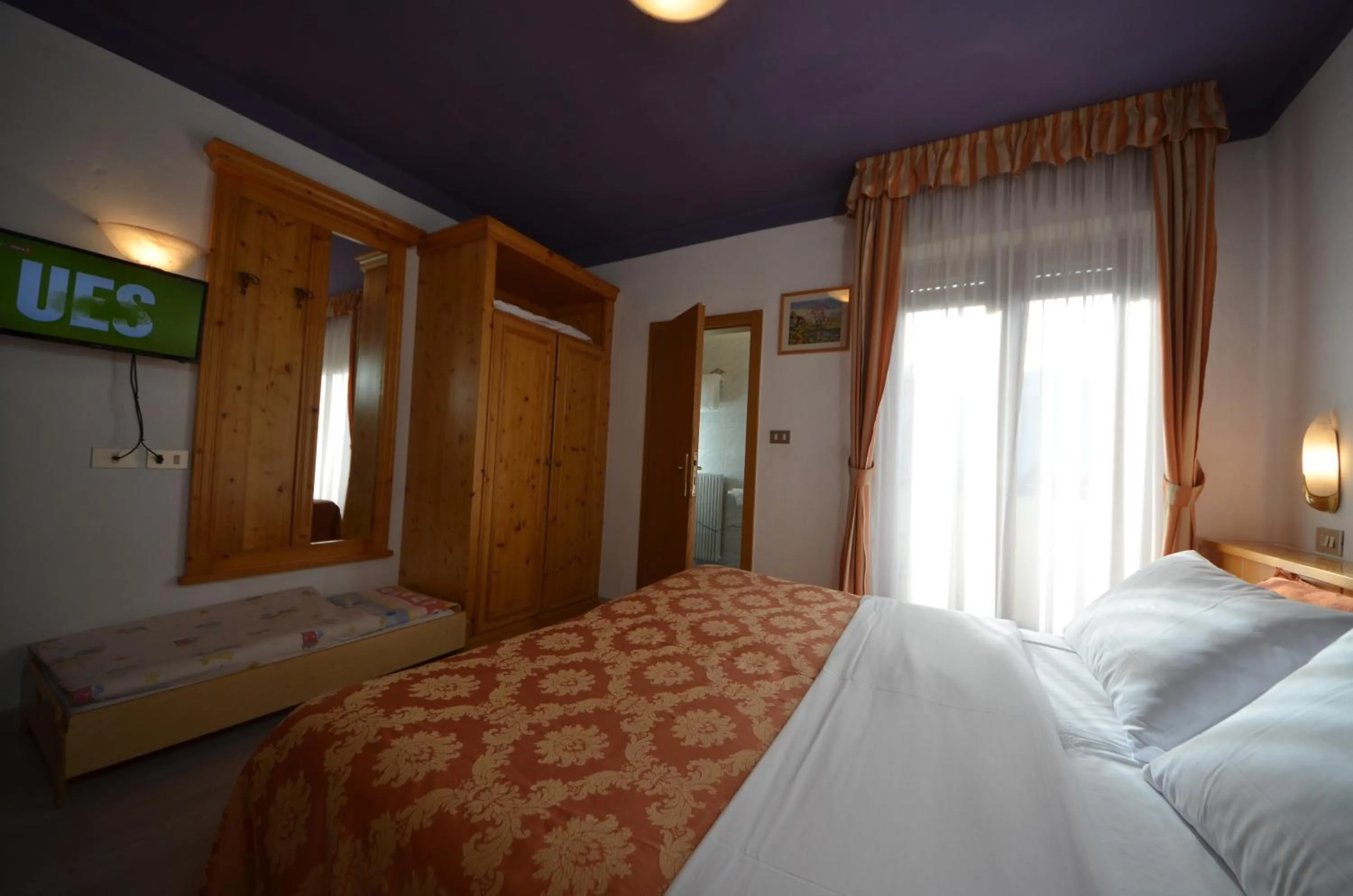 Bed in Family Hotel Primavera