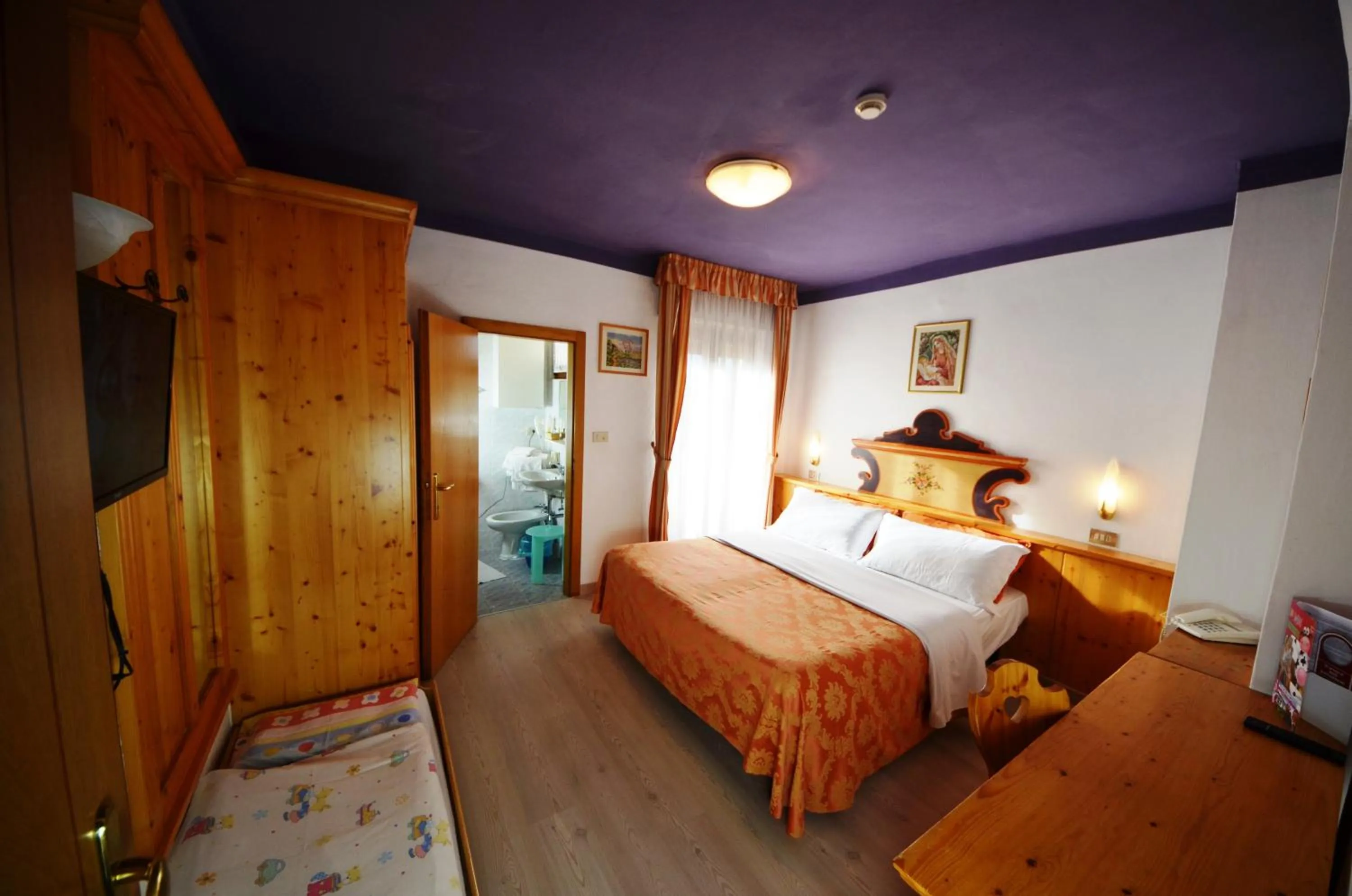 Bed in Family Hotel Primavera