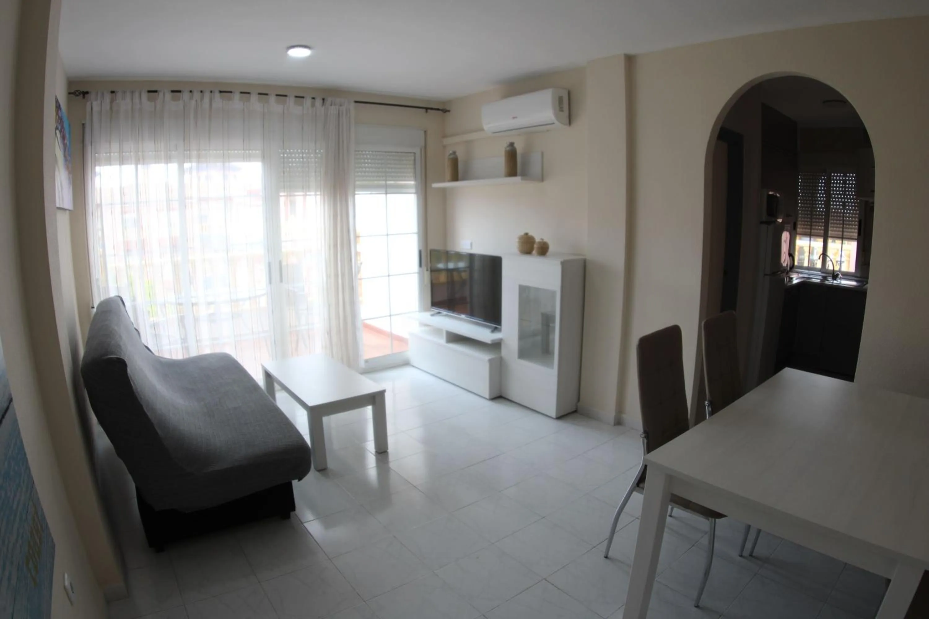 Communal lounge/ TV room in Apartamentos Marina Internacional