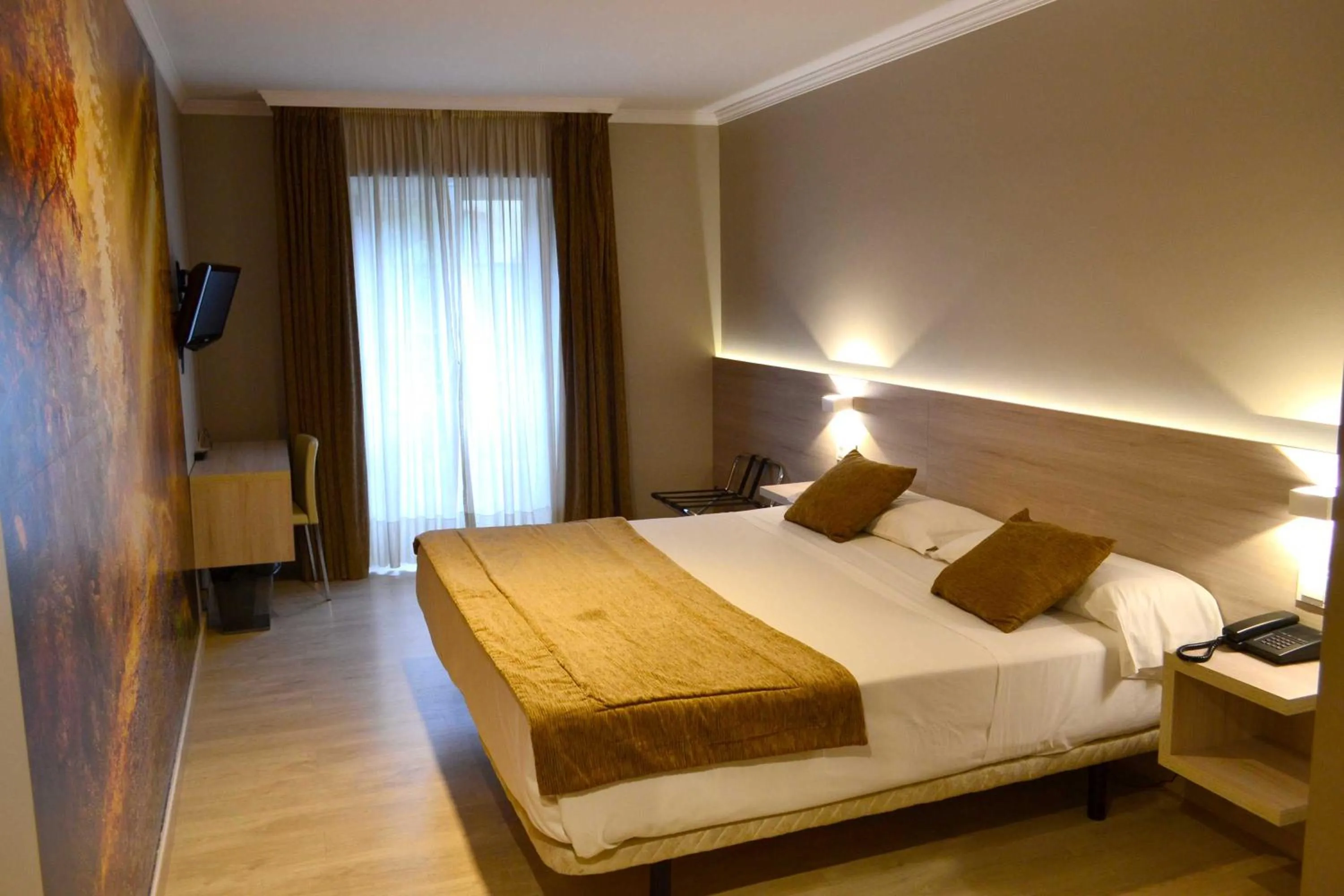 Bed in Hotel Alda San Carlos