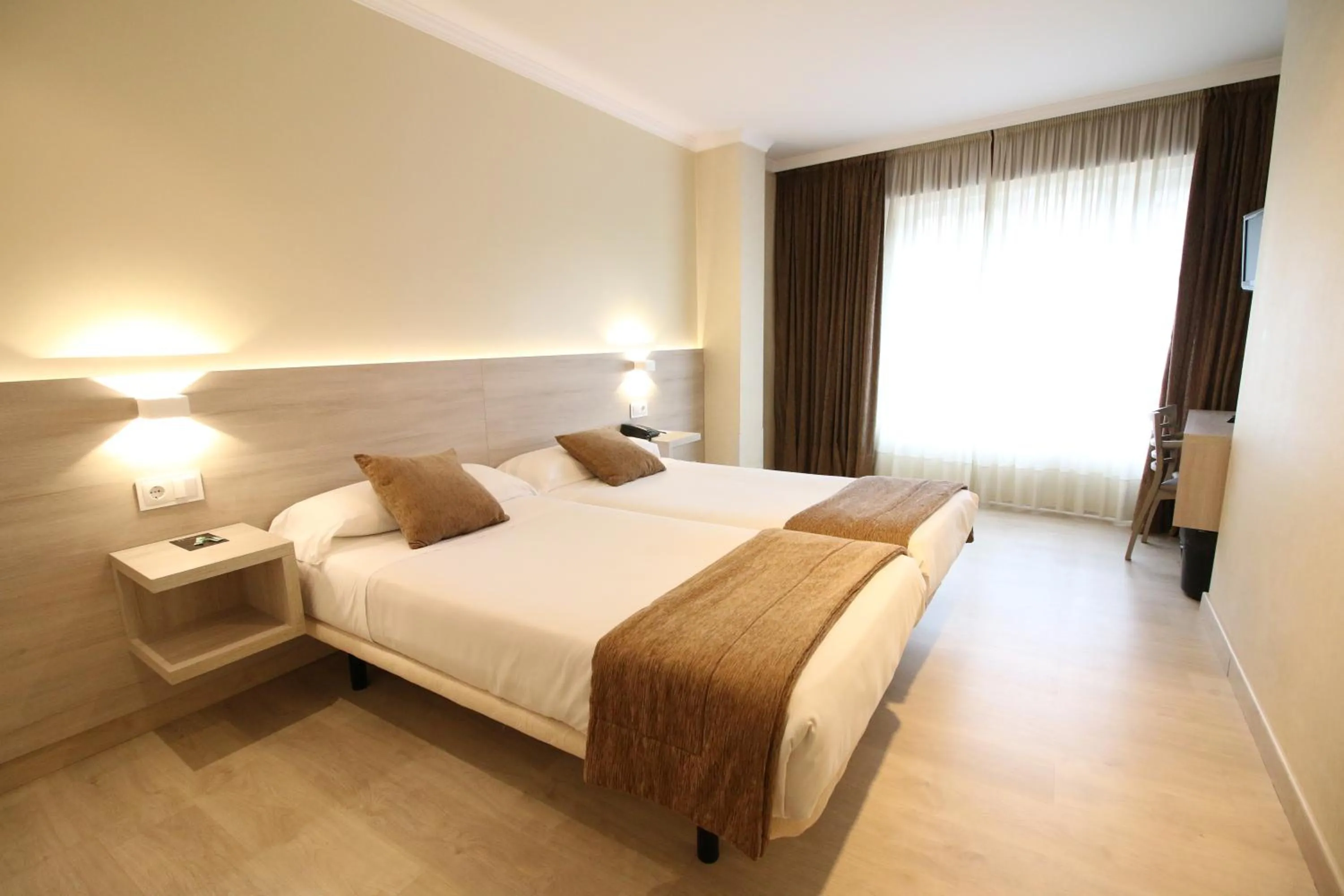 Bed in Hotel Alda San Carlos